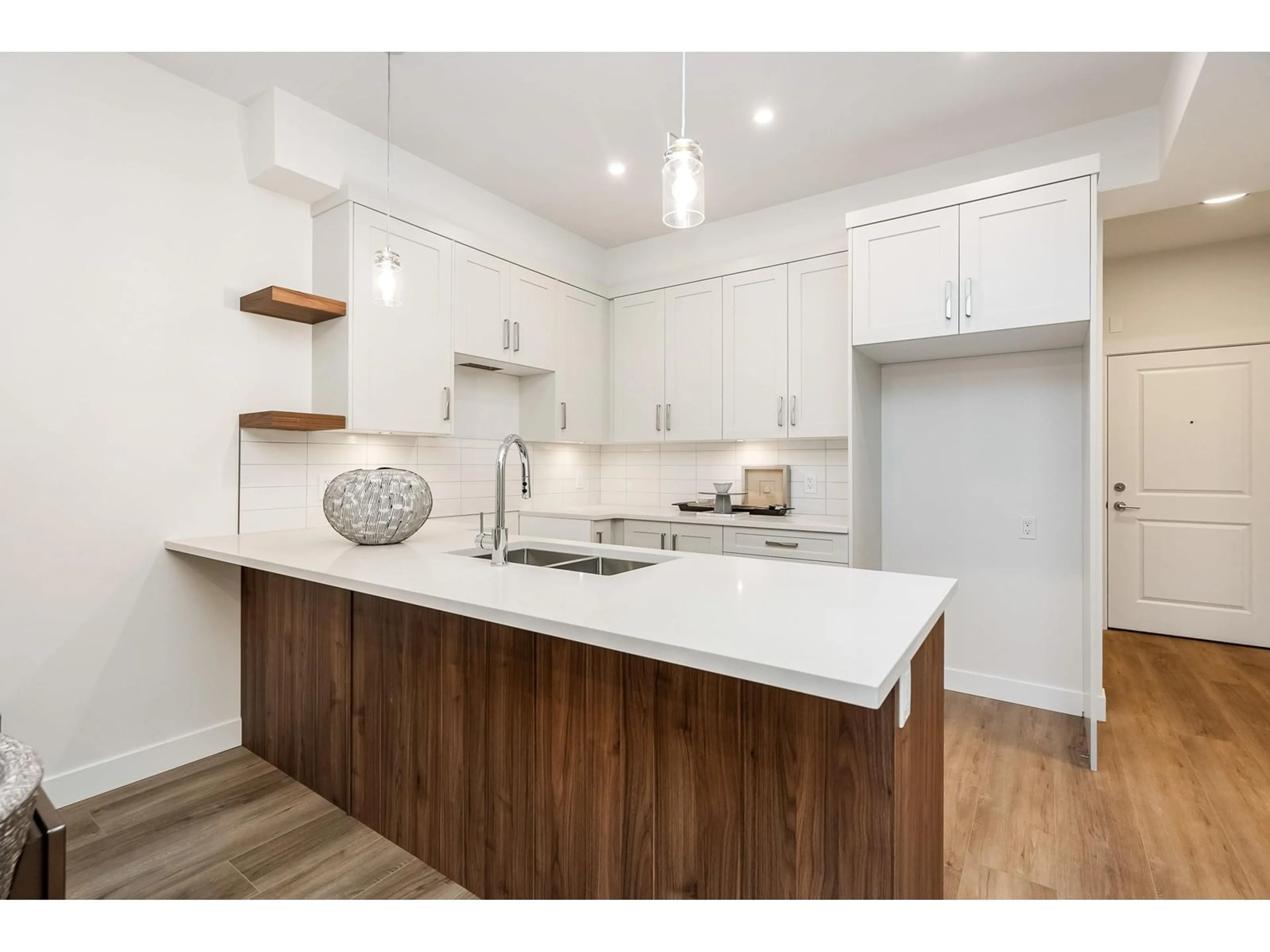 Open concept kitchen, wood/laminate floor for 121 - 8497 YOUNG ROAD, Chilliwack British Columbia V2P4P2