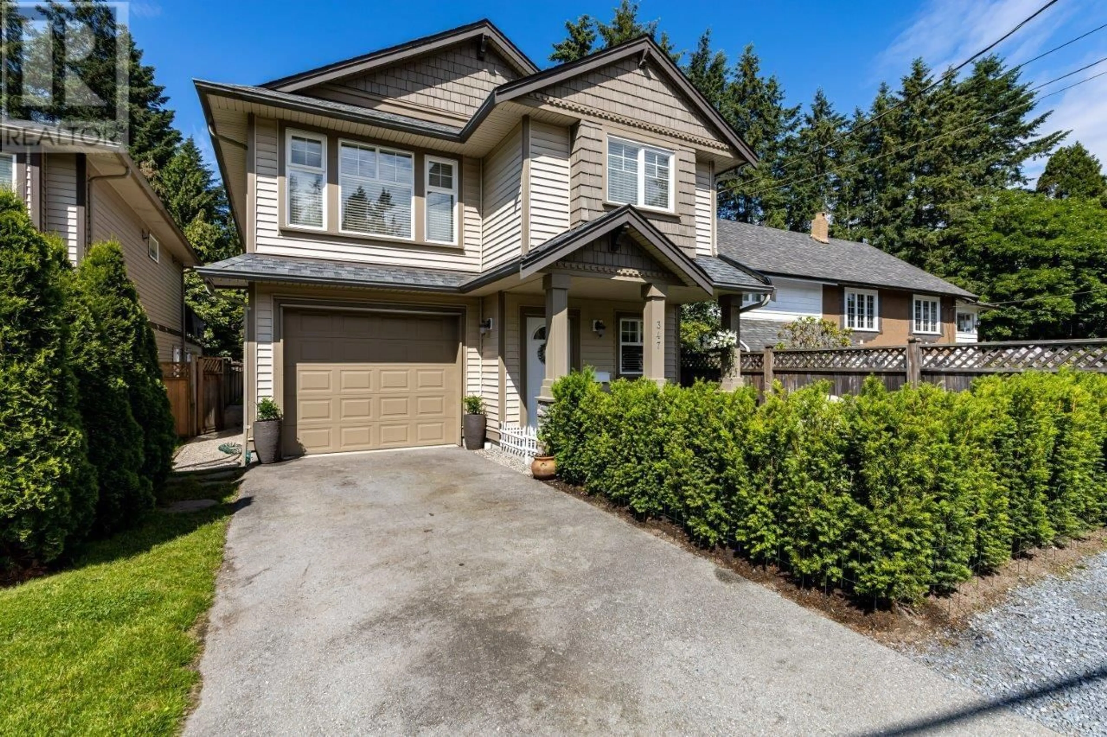 Home with vinyl exterior material, street for 347 SEYMOUR RIVER PLACE, North Vancouver British Columbia V7H1S6