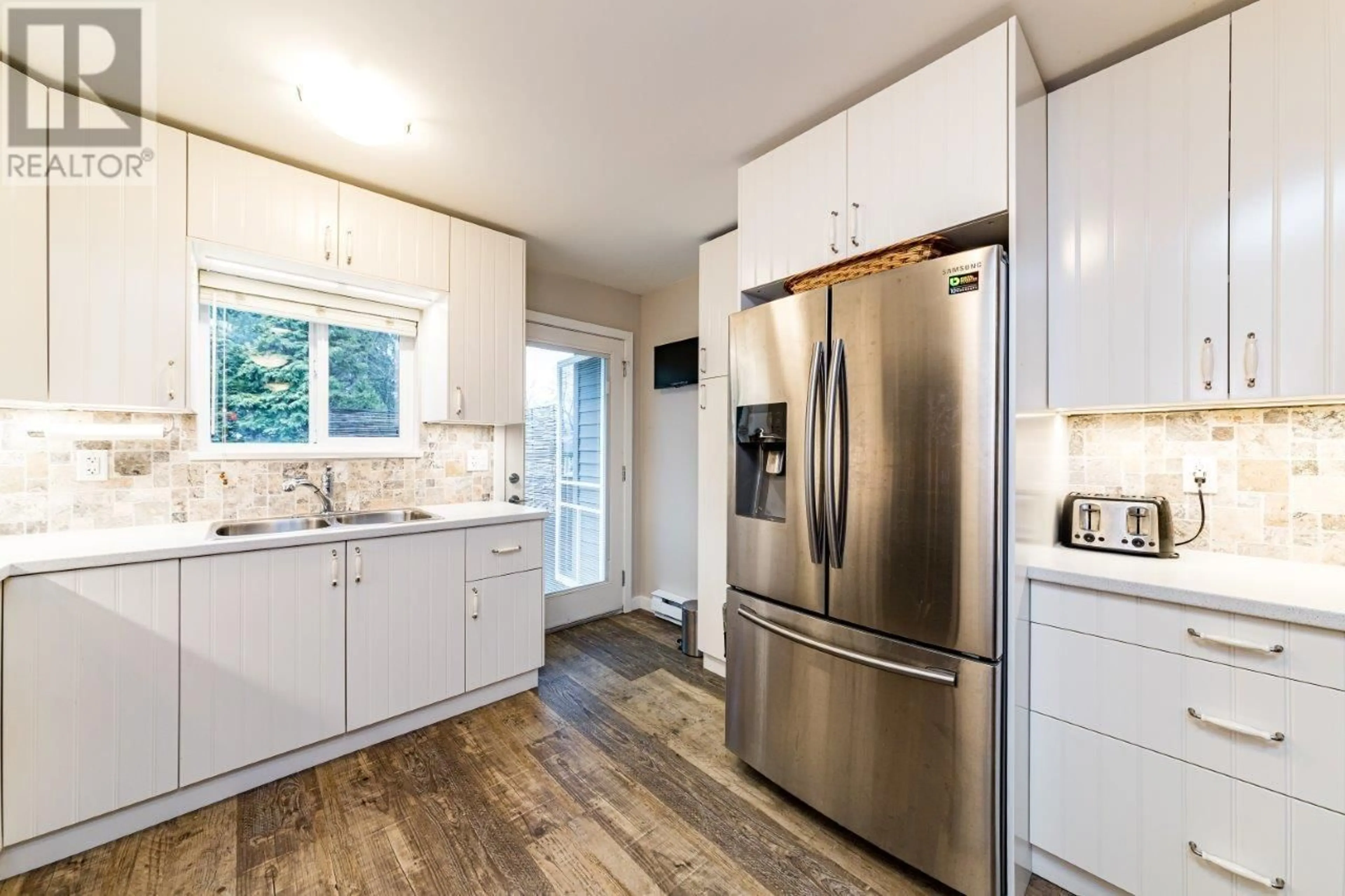 Open concept kitchen, unknown for 347 SEYMOUR RIVER PLACE, North Vancouver British Columbia V7H1S6
