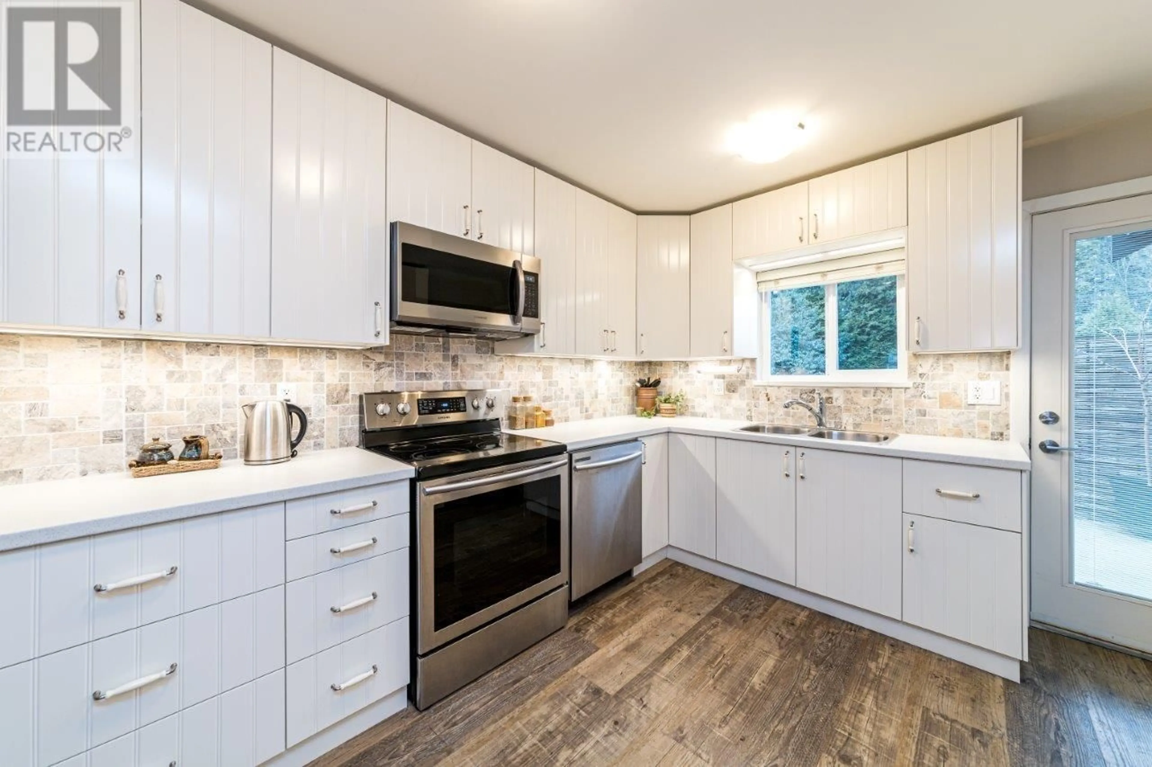 Open concept kitchen, unknown for 347 SEYMOUR RIVER PLACE, North Vancouver British Columbia V7H1S6