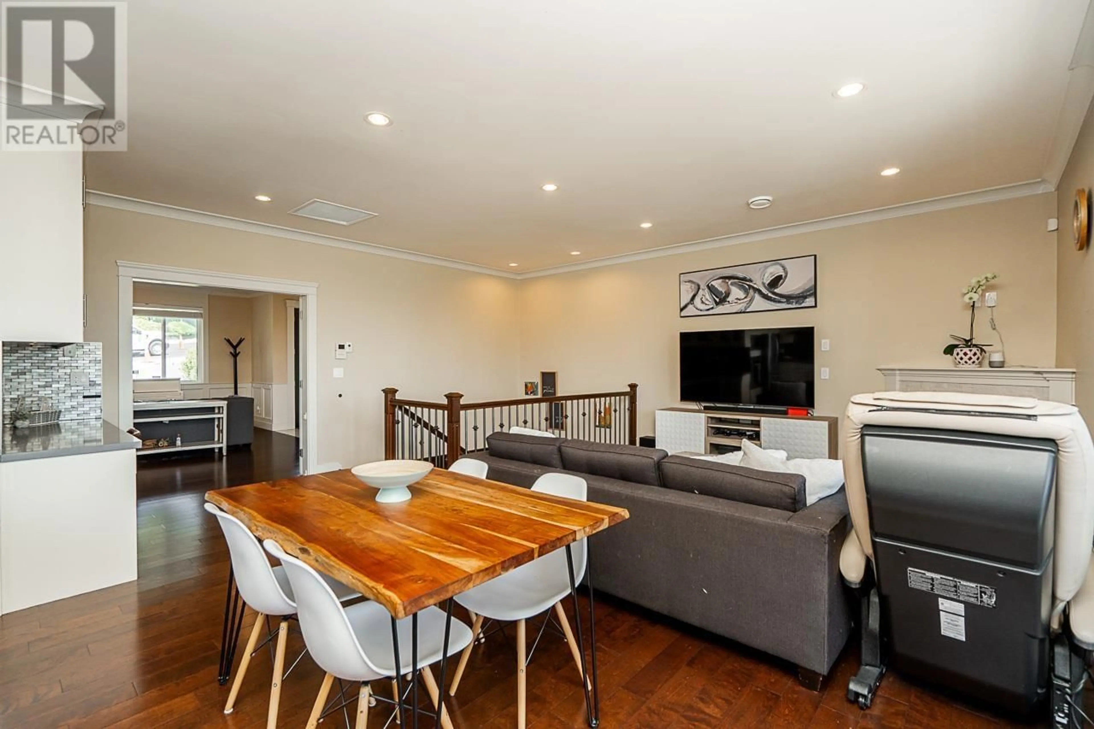 Living room with furniture, wood/laminate floor for 8358 NELSON AVENUE, Burnaby British Columbia V5J4E5