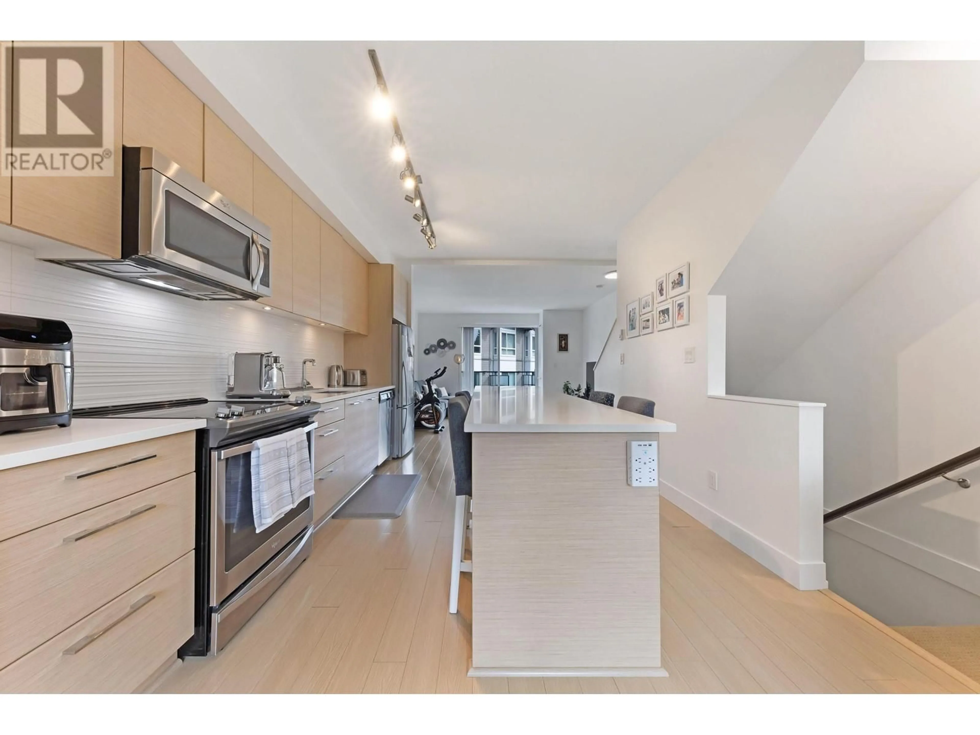 Open concept kitchen, unknown for 13 - 909 CLARKE ROAD, Port Moody British Columbia V3H1L6
