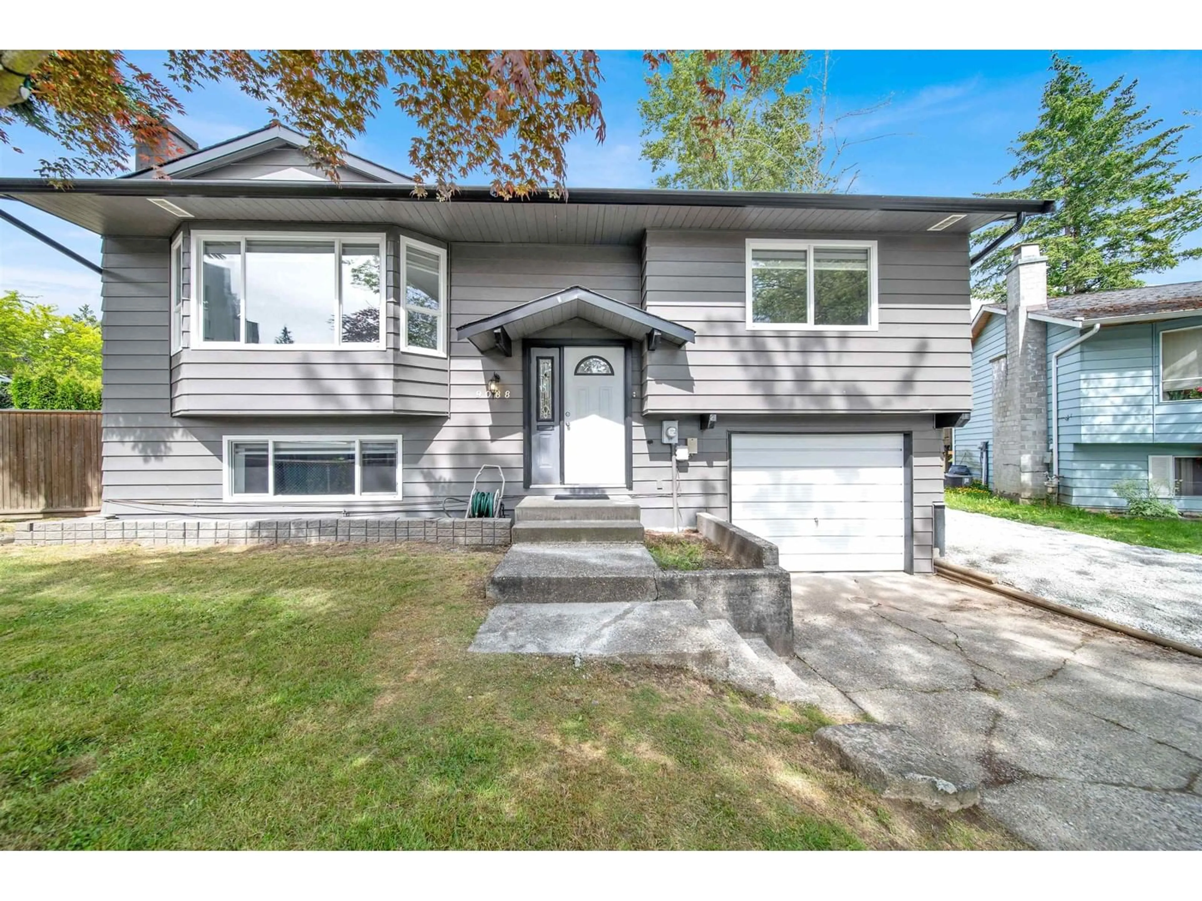 Home with vinyl exterior material, street for 9088 146A, Surrey British Columbia V3R6X7