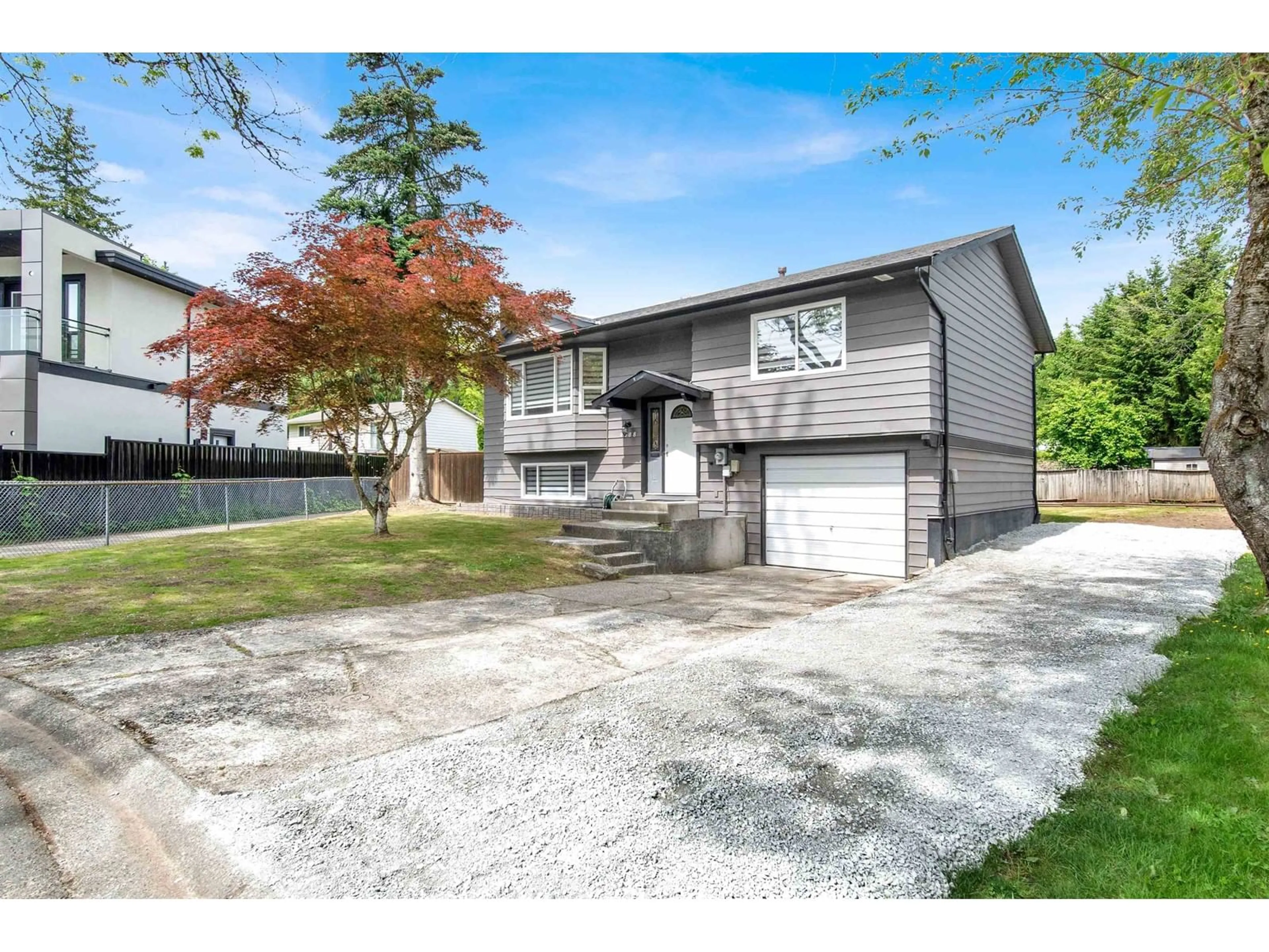 Home with vinyl exterior material, street for 9088 146A, Surrey British Columbia V3R6X7