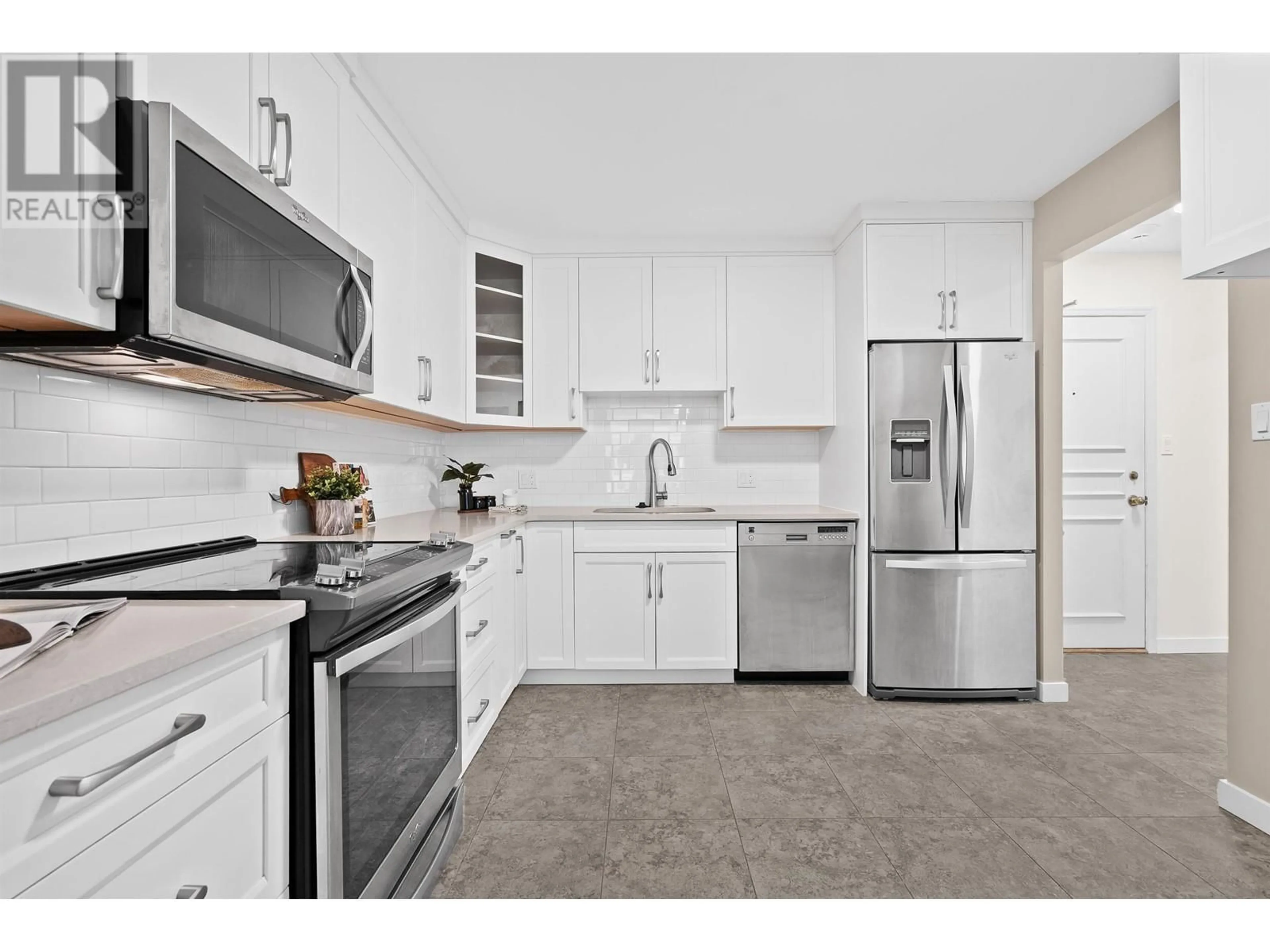 Standard kitchen, ceramic/tile floor for 408 - 518 MOBERLY ROAD, Vancouver British Columbia V5Z4G3