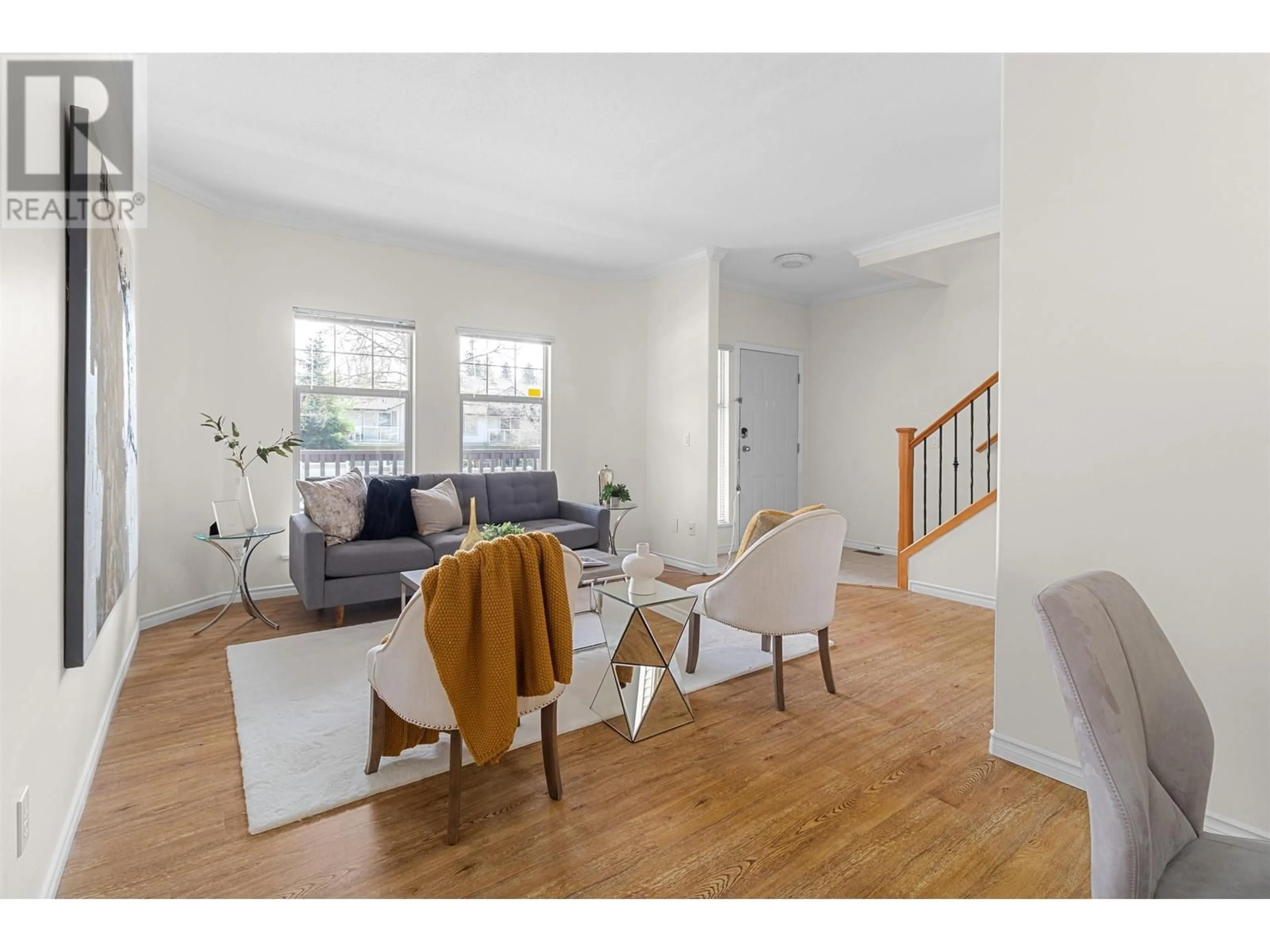 Living room with furniture, wood/laminate floor for 22783 116 AVENUE, Maple Ridge British Columbia V2X3N6