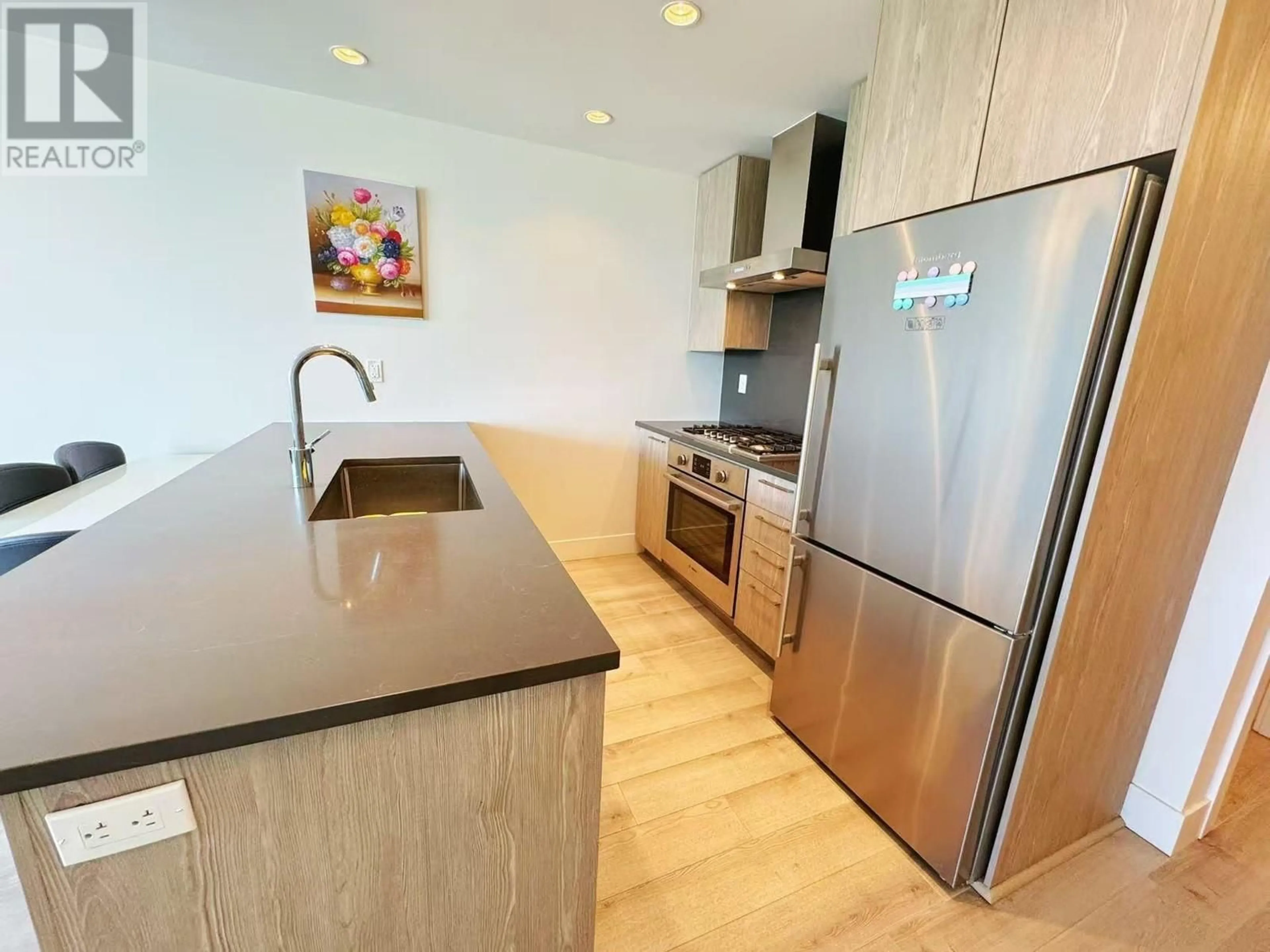 Open concept kitchen, unknown for 711 - 10788 NO. 5 ROAD, Richmond British Columbia V6W0B7