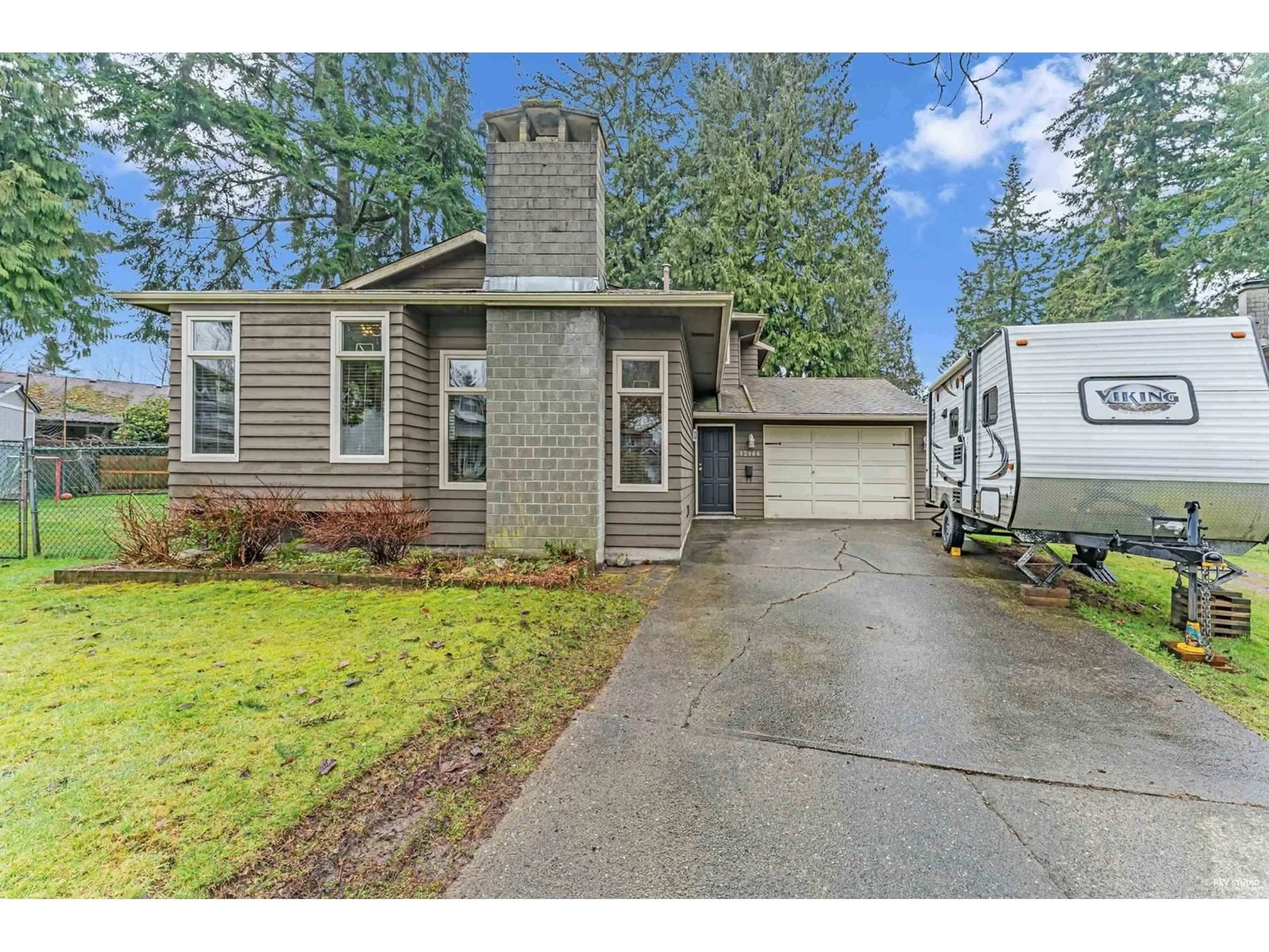 Home with vinyl exterior material, street for 12966 61B, Surrey British Columbia V3X3G5
