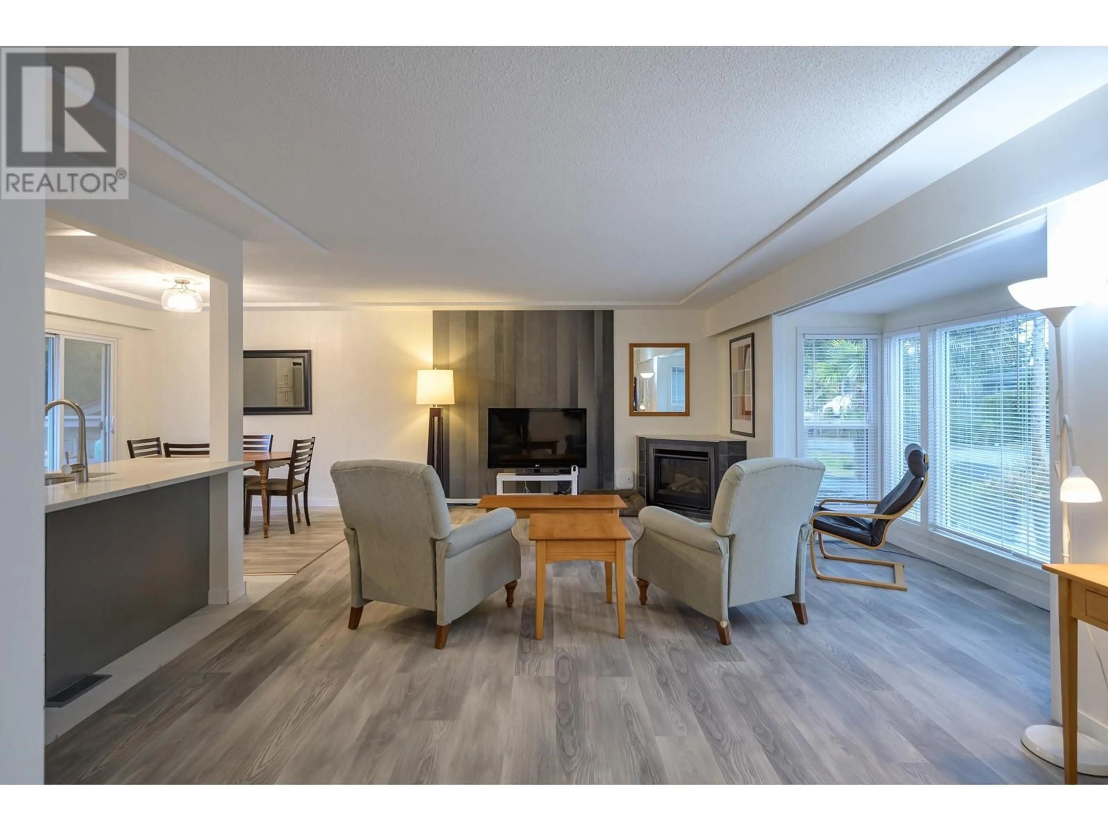 Living room with furniture, wood/laminate floor for 5153 CLIFF DRIVE, Delta British Columbia V4M2C4