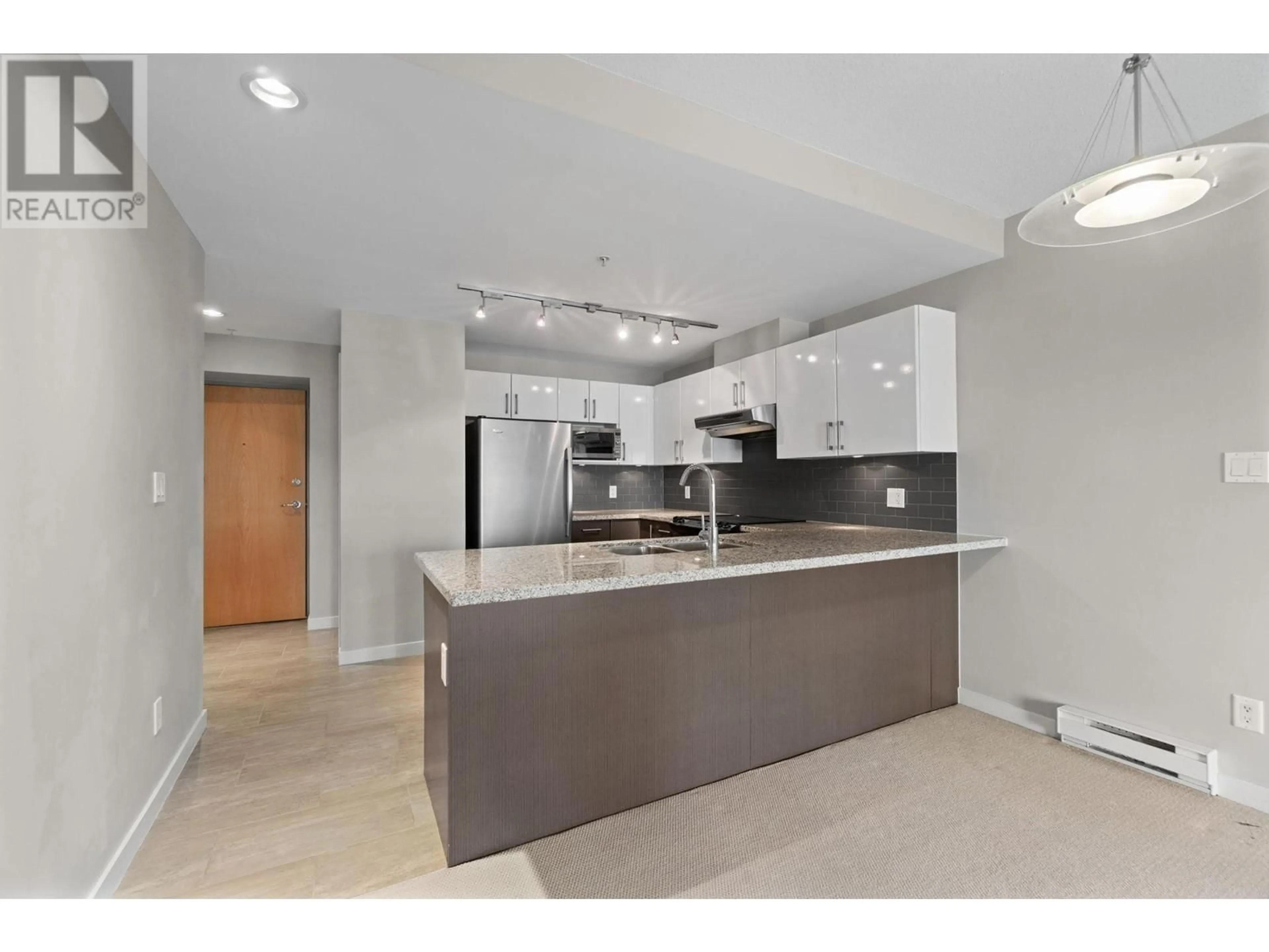 Open concept kitchen, unknown for 606 - 14 BEGBIE STREET, New Westminster British Columbia V3M0C4