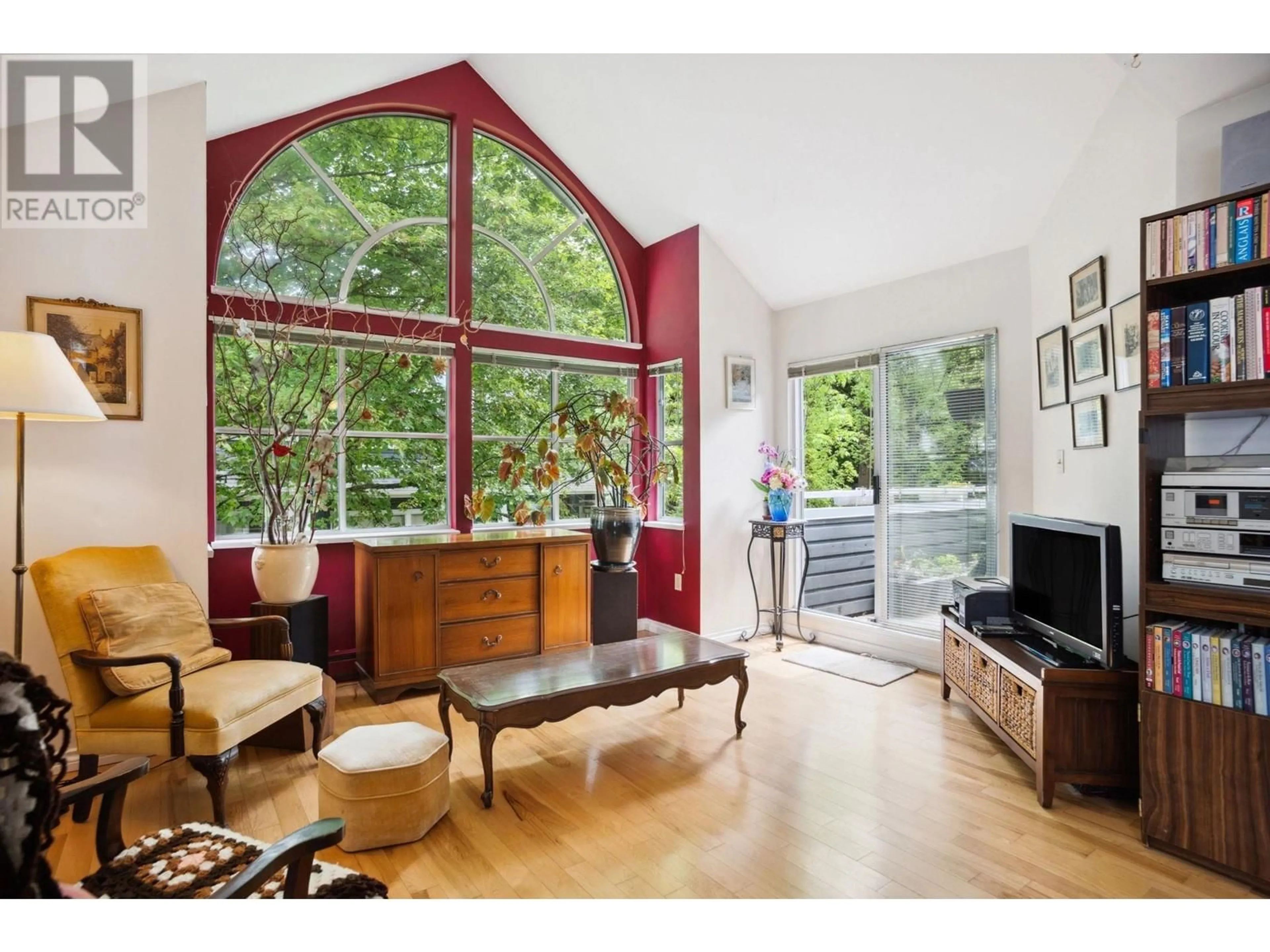 Living room with furniture, wood/laminate floor for 217 - 2960 29TH AVENUE, Vancouver British Columbia V5R5Z5