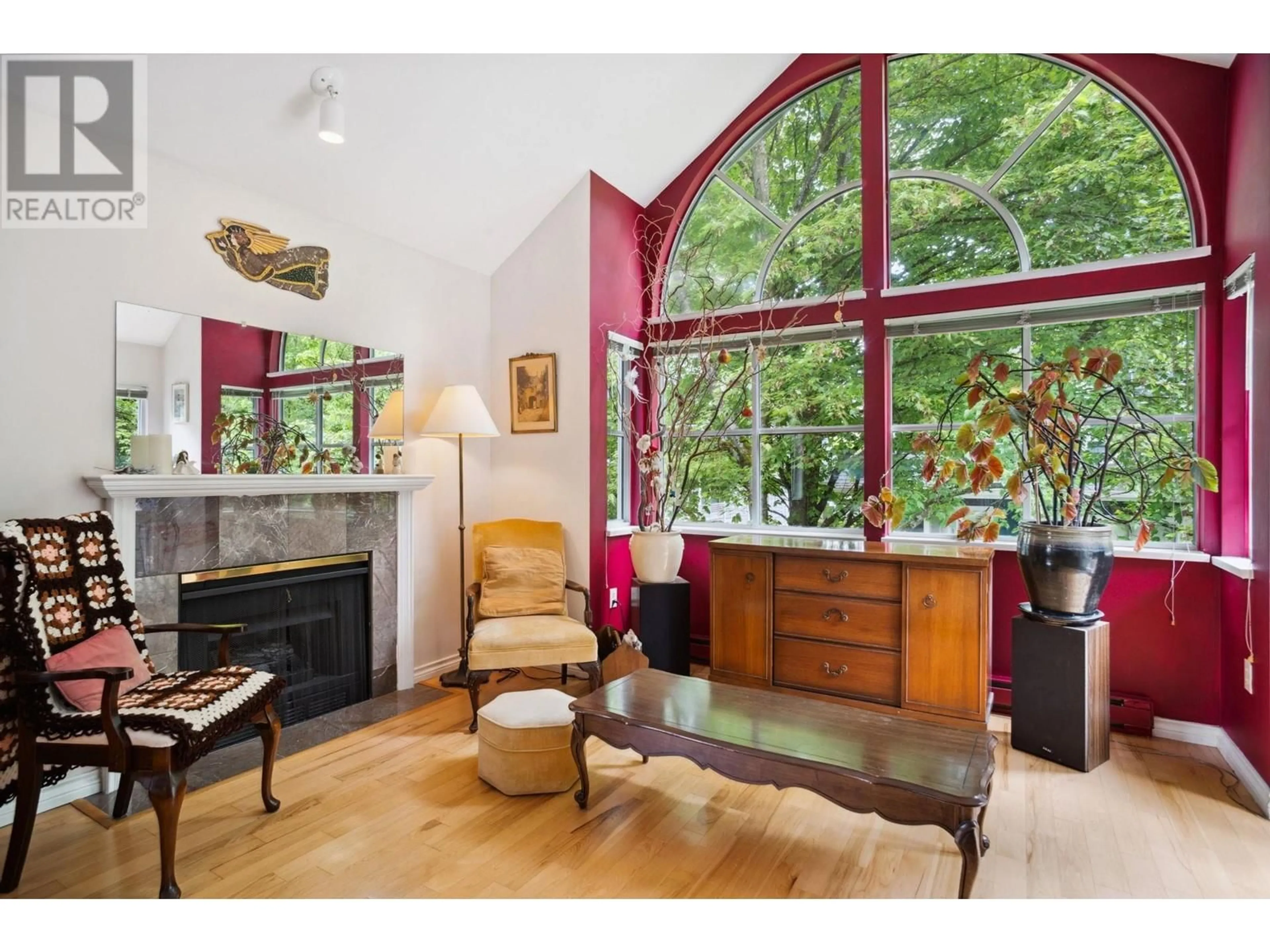 Living room with furniture, wood/laminate floor for 217 - 2960 29TH AVENUE, Vancouver British Columbia V5R5Z5
