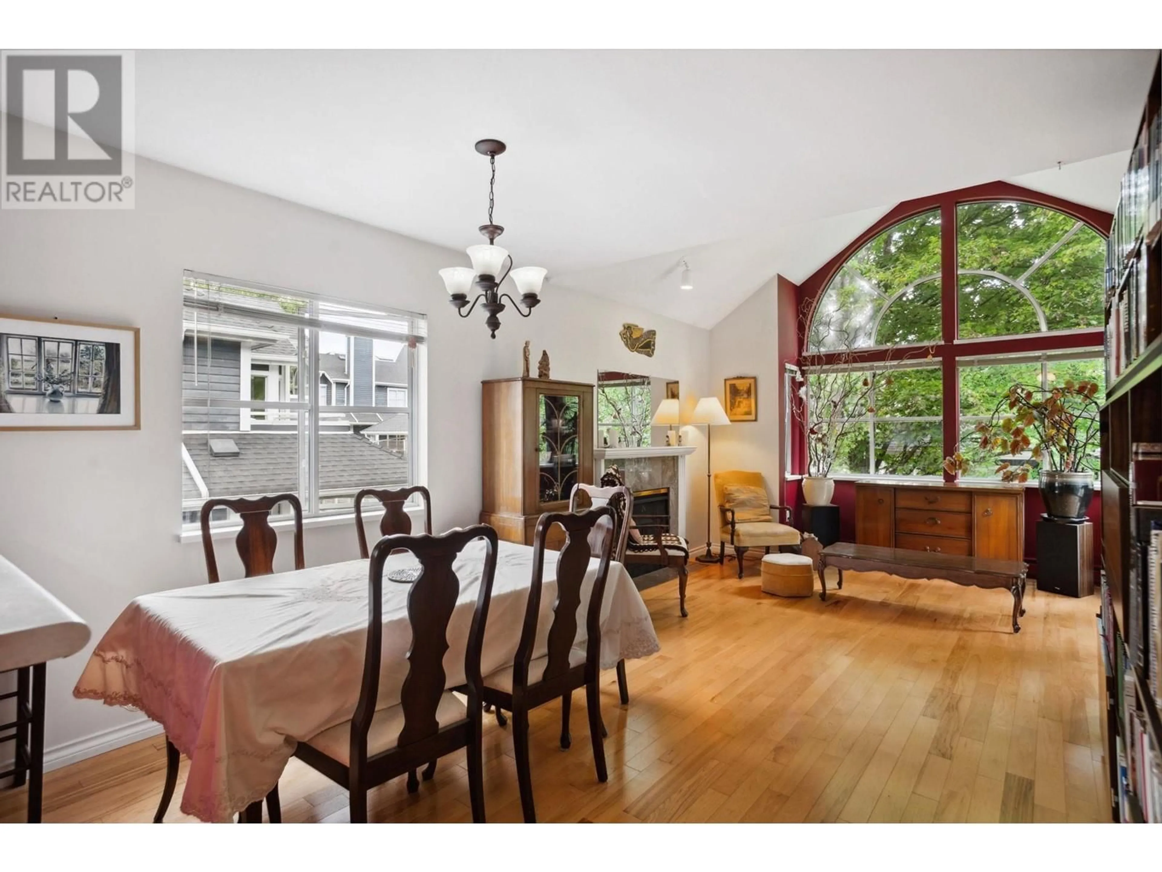 Dining room, wood/laminate floor for 217 - 2960 29TH AVENUE, Vancouver British Columbia V5R5Z5
