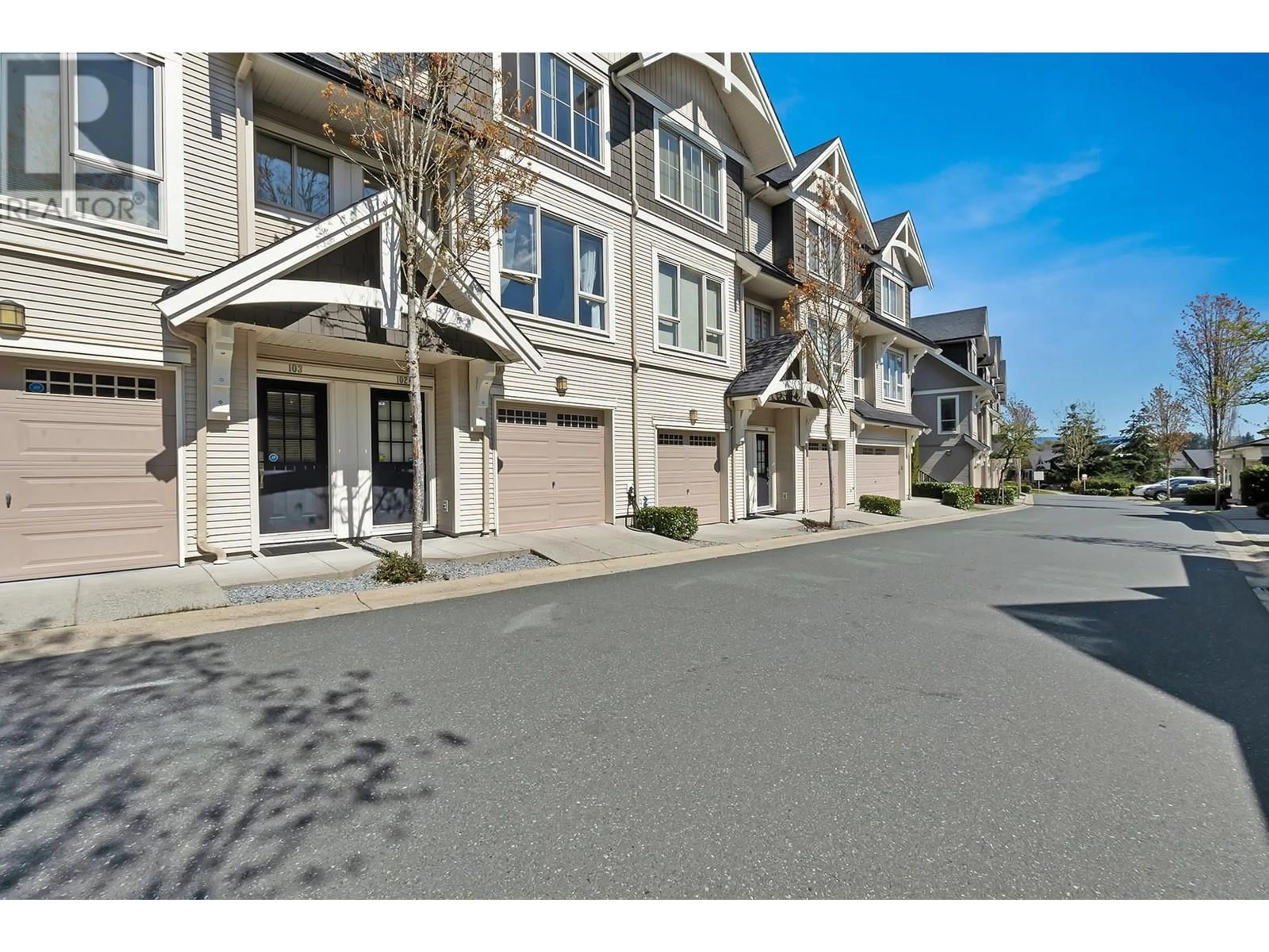 A pic from outside/outdoor area/front of a property/back of a property/a pic from drone, street for 102 - 1369 PURCELL DRIVE, Coquitlam British Columbia V3E0C1