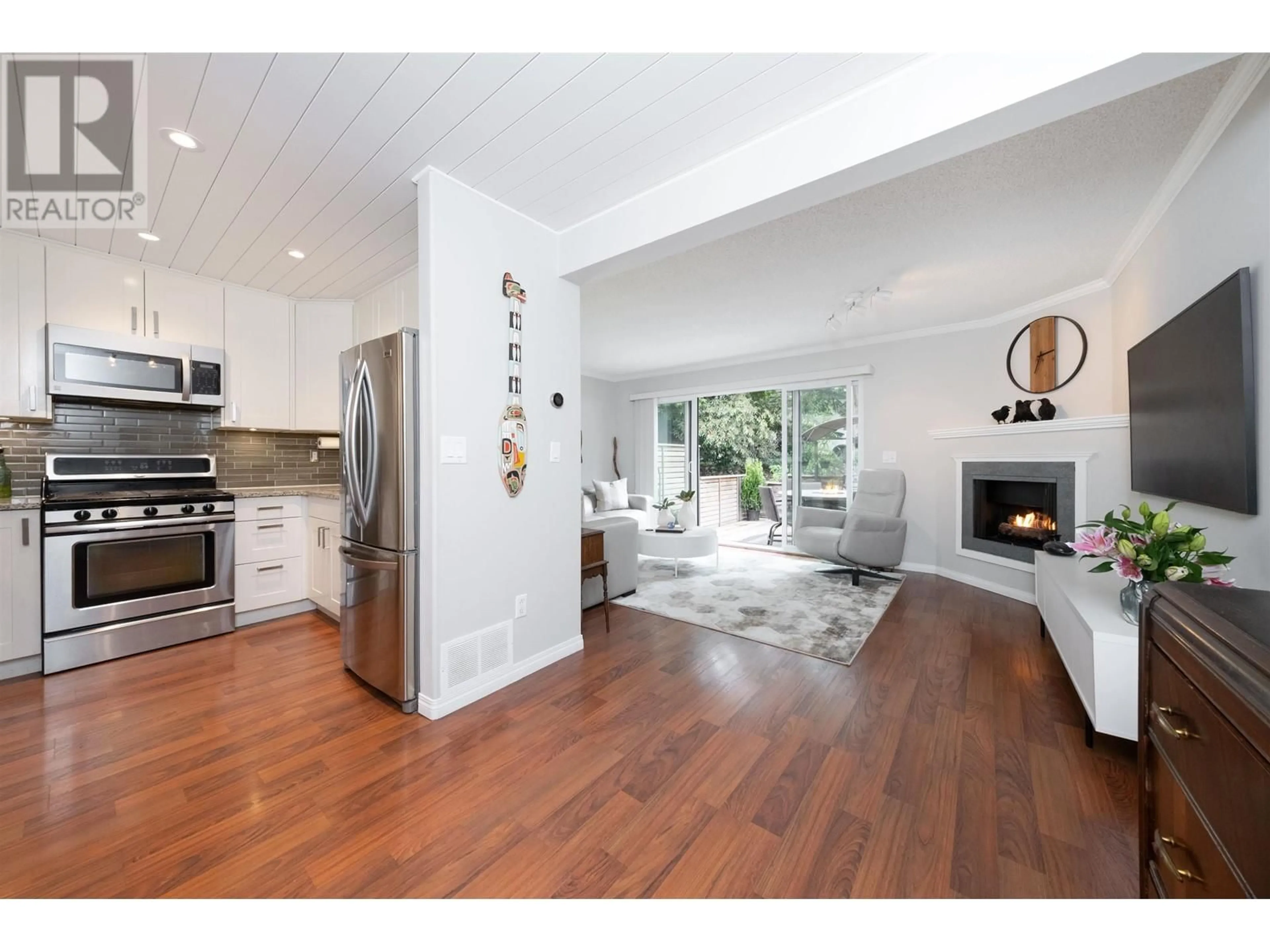 Open concept kitchen, wood/laminate floor for 53 - 1930 CEDAR VILLAGE CRESCENT, North Vancouver British Columbia V7J3M5