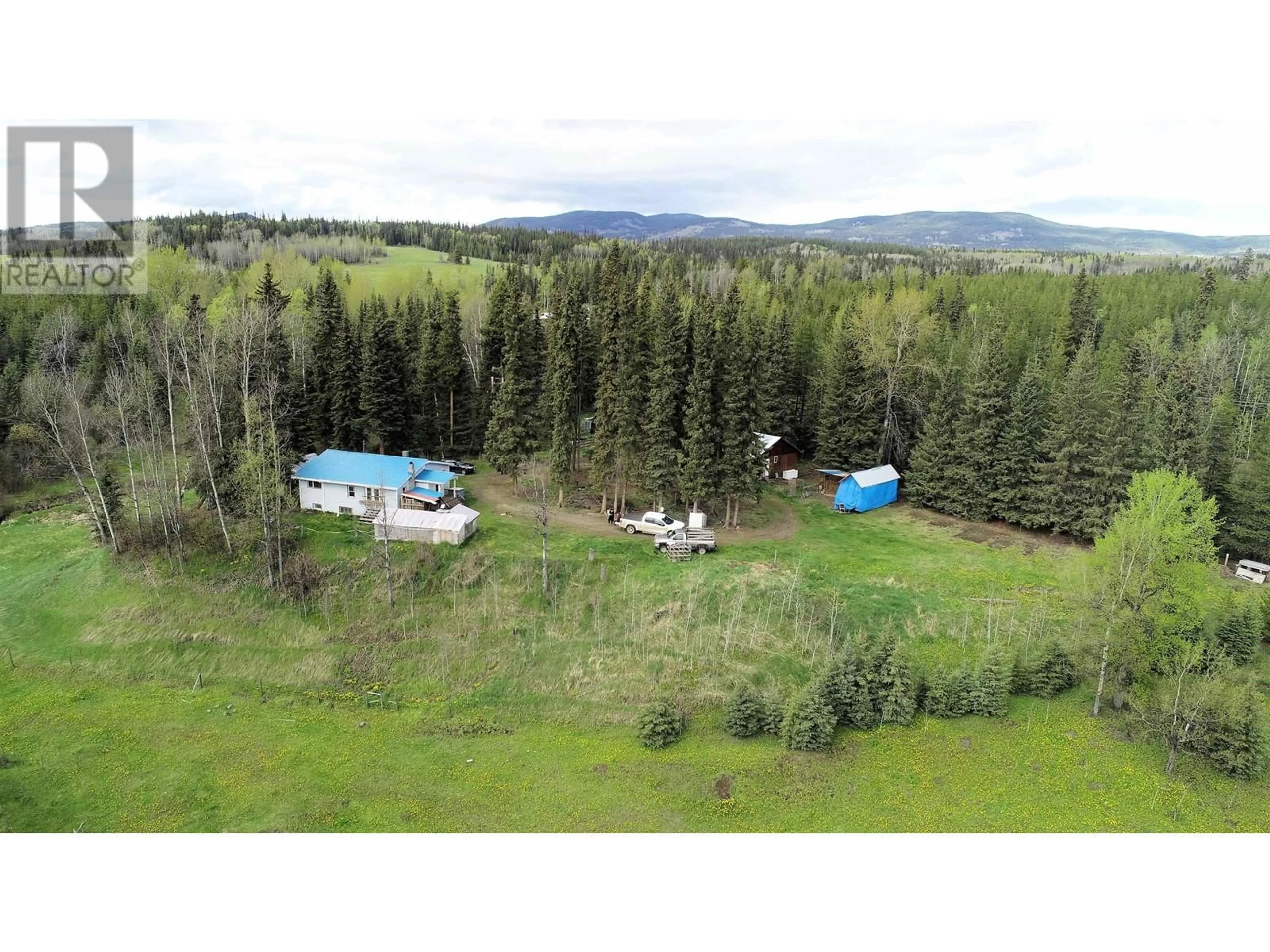 A pic from outside/outdoor area/front of a property/back of a property/a pic from drone, mountain view for 44389 16 HIGHWAY, Topley British Columbia V0J2Y0