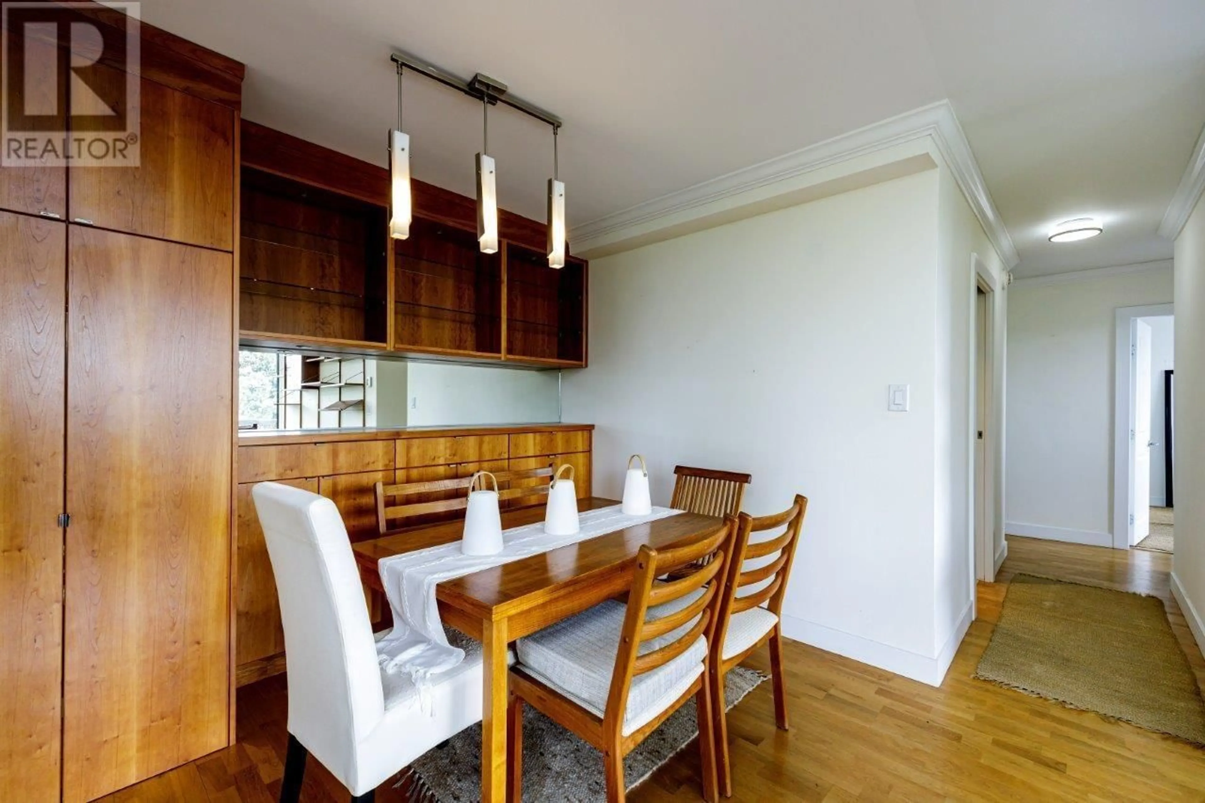 Dining room, wood/laminate floor for 403 - 114 KEITH ROAD, North Vancouver British Columbia V7M3C9