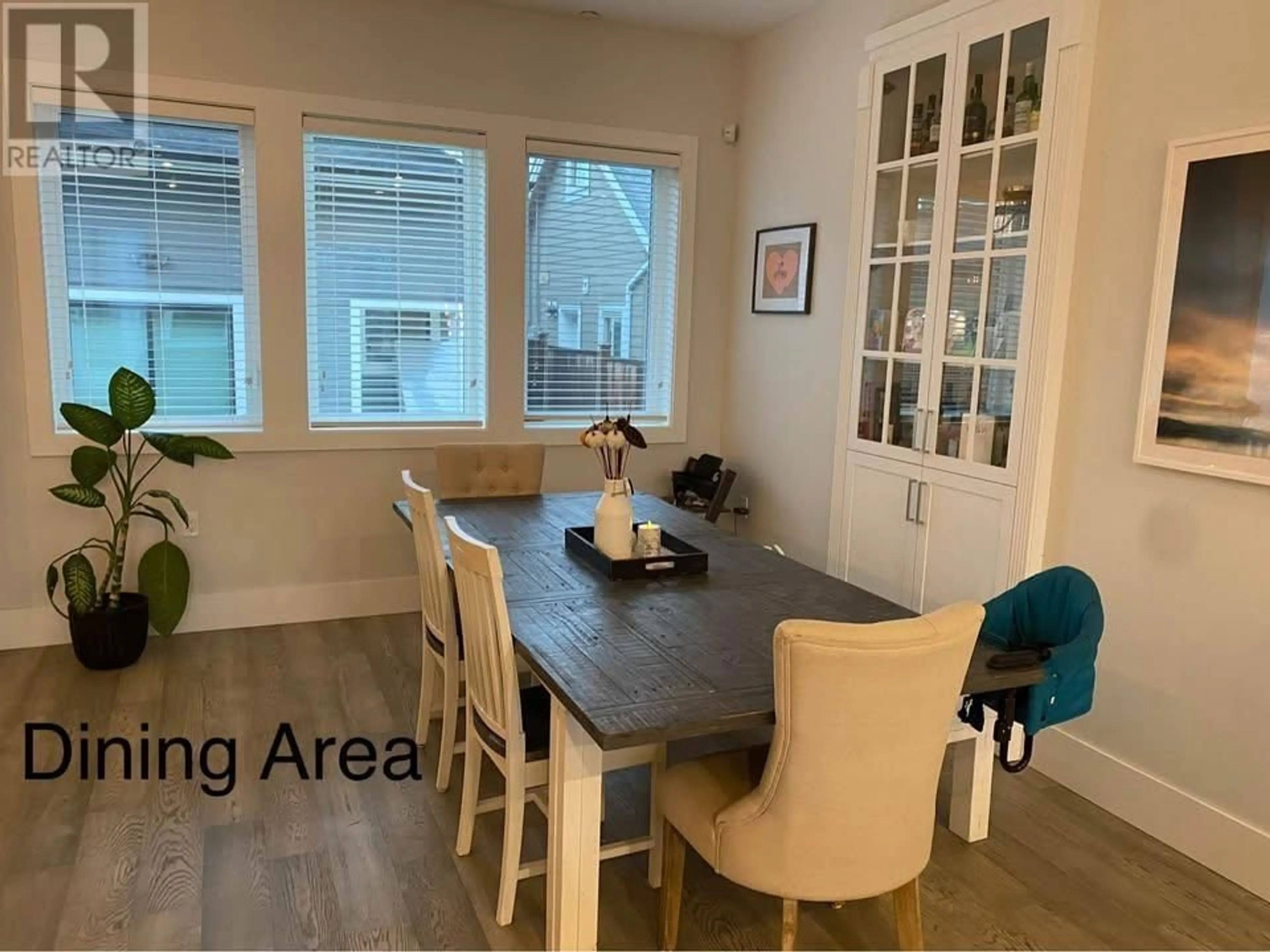 Dining room, wood/laminate floor for 3345 PARKER STREET, Vancouver British Columbia V5K2W1