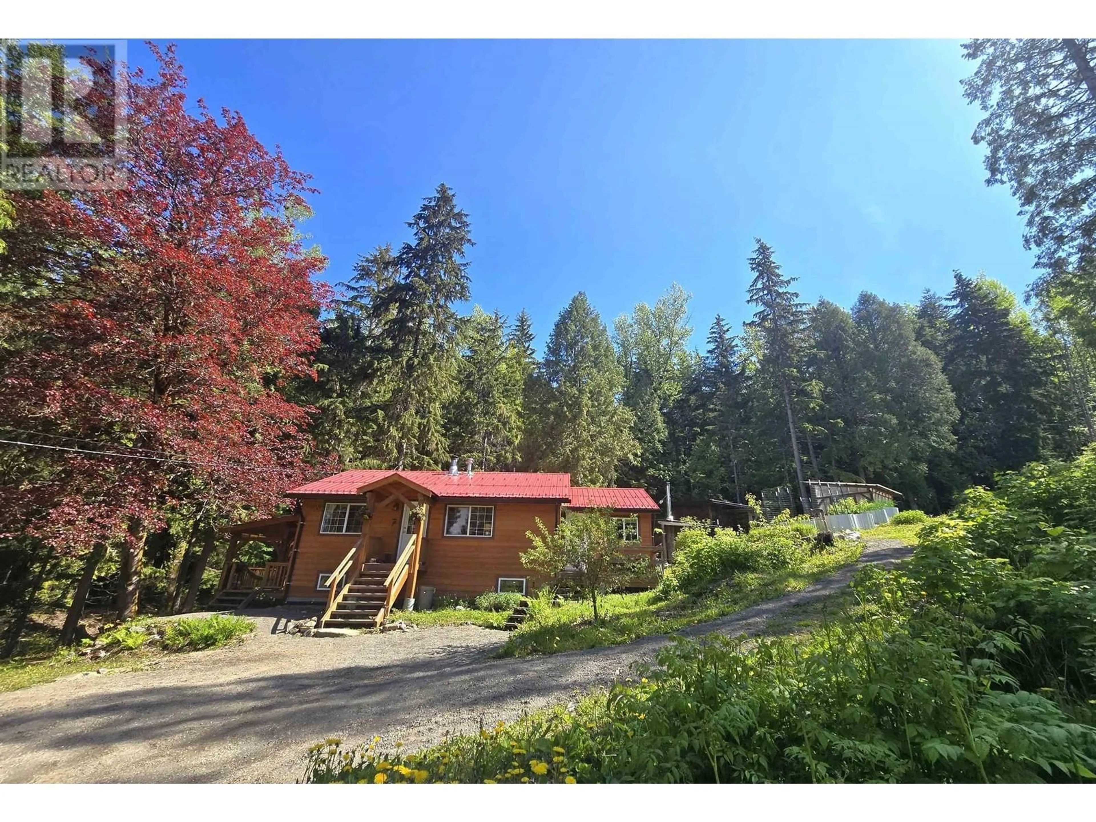 A pic from outside/outdoor area/front of a property/back of a property/a pic from drone, forest/trees view for 4518 SPARKS STREET, Terrace British Columbia V8G2W5