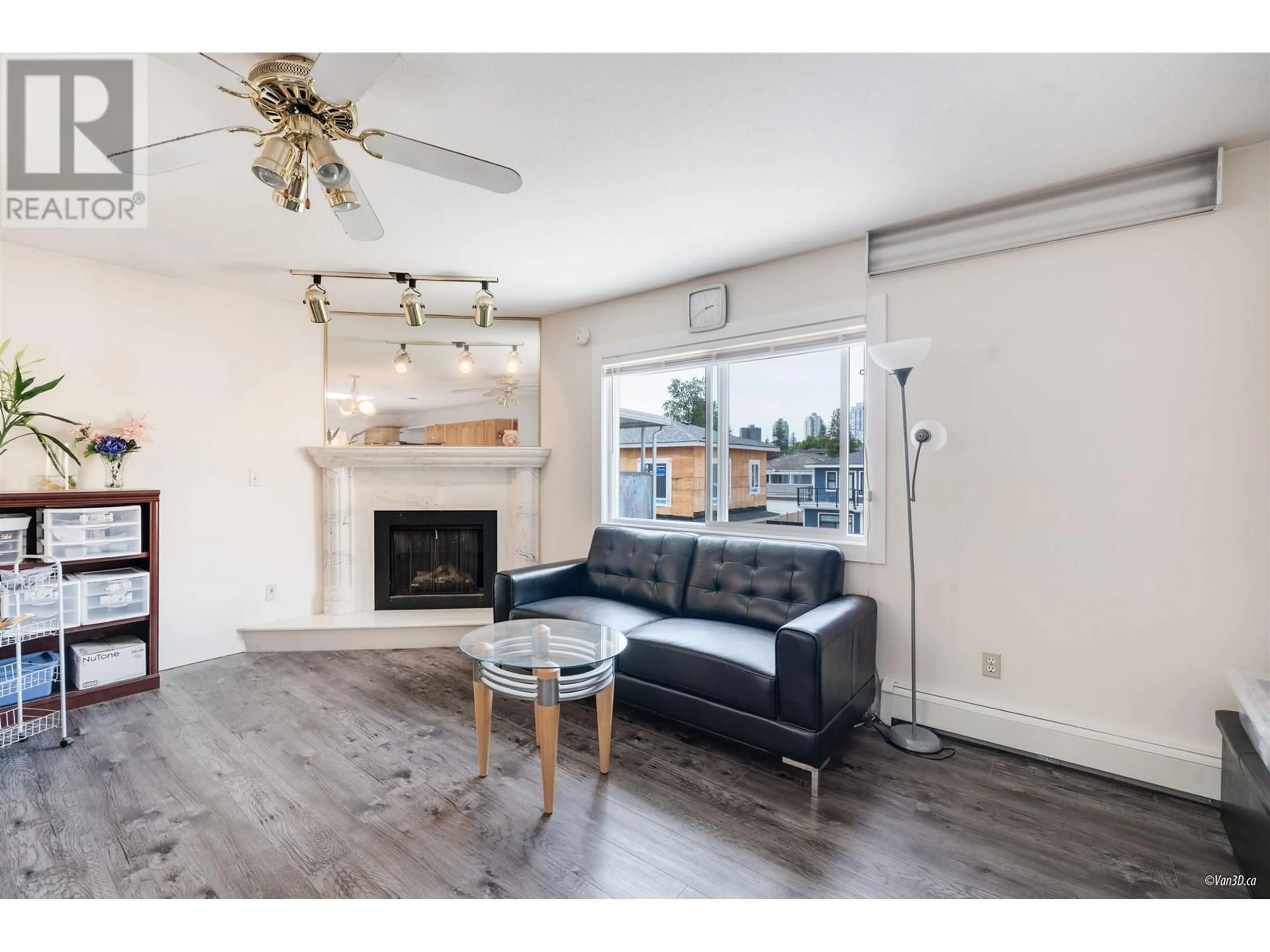 Living room with furniture, wood/laminate floor for 7351 12TH AVENUE, Burnaby British Columbia V3N2J8
