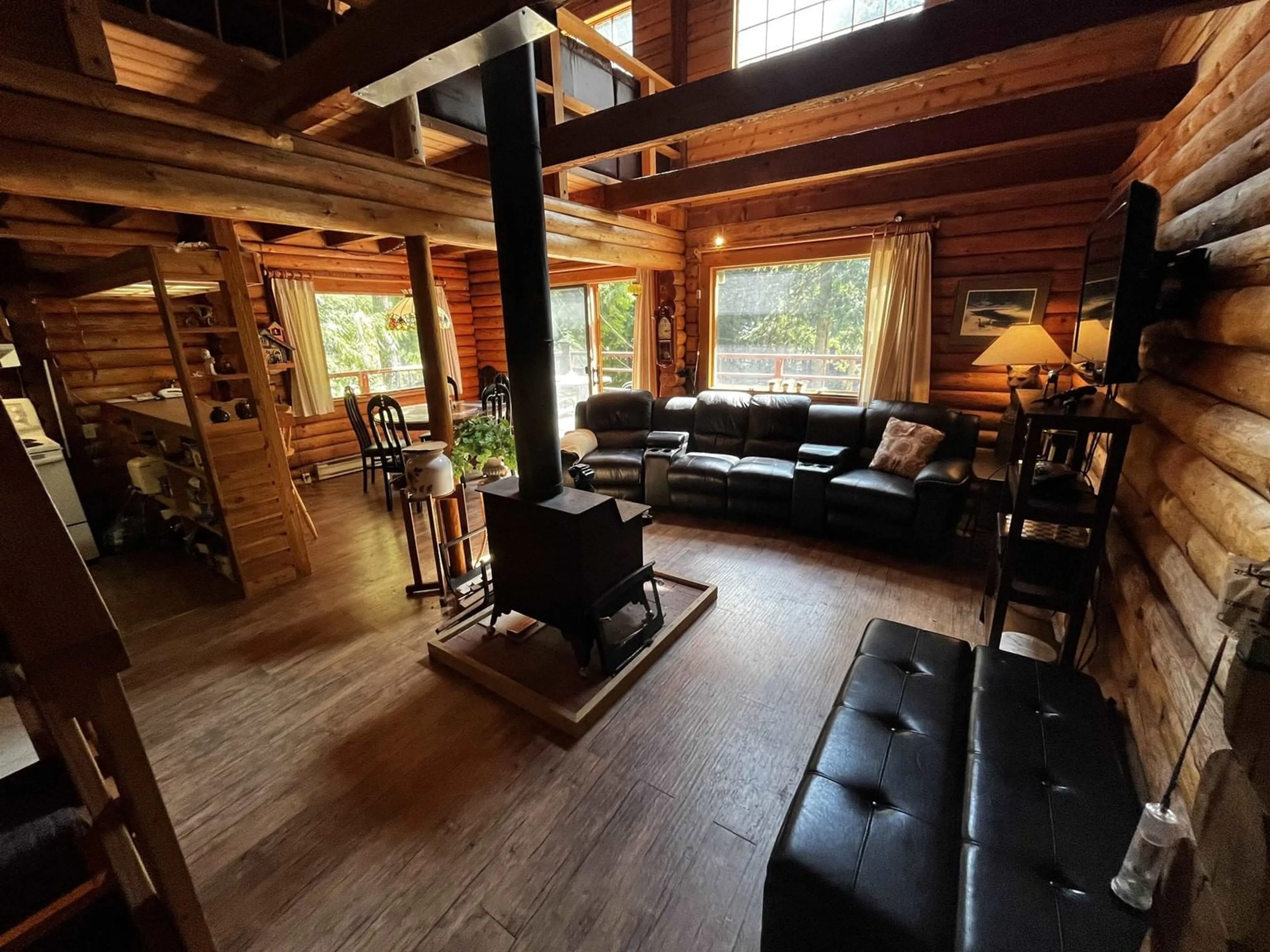 Living room with furniture, wood/laminate floor for A7 - 14421 SLALOM DRIVE, Hope British Columbia V0X1L5