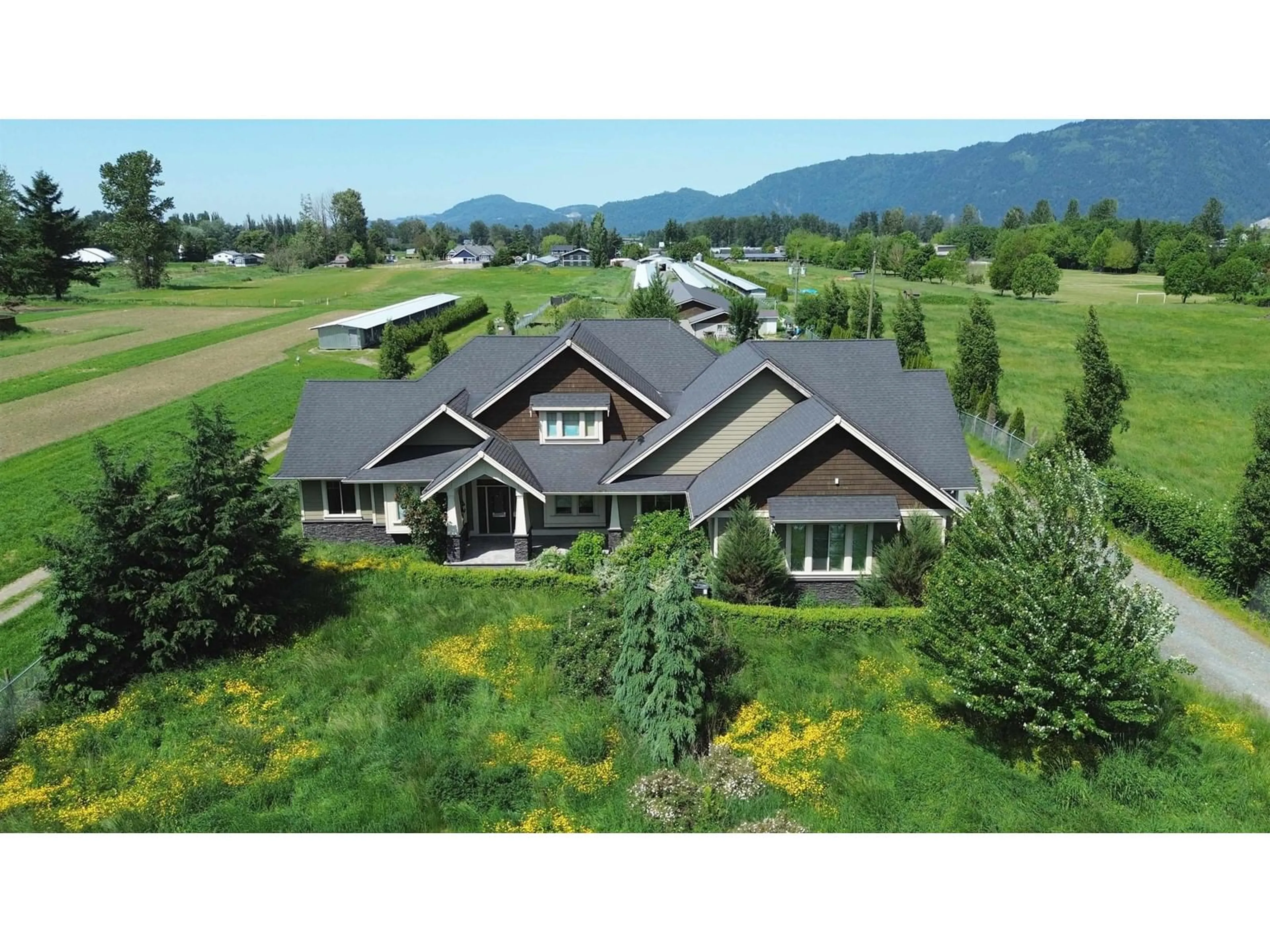 A pic from outside/outdoor area/front of a property/back of a property/a pic from drone, mountain view for 4195 ECKERT STREET, Yarrow British Columbia V2R5J6