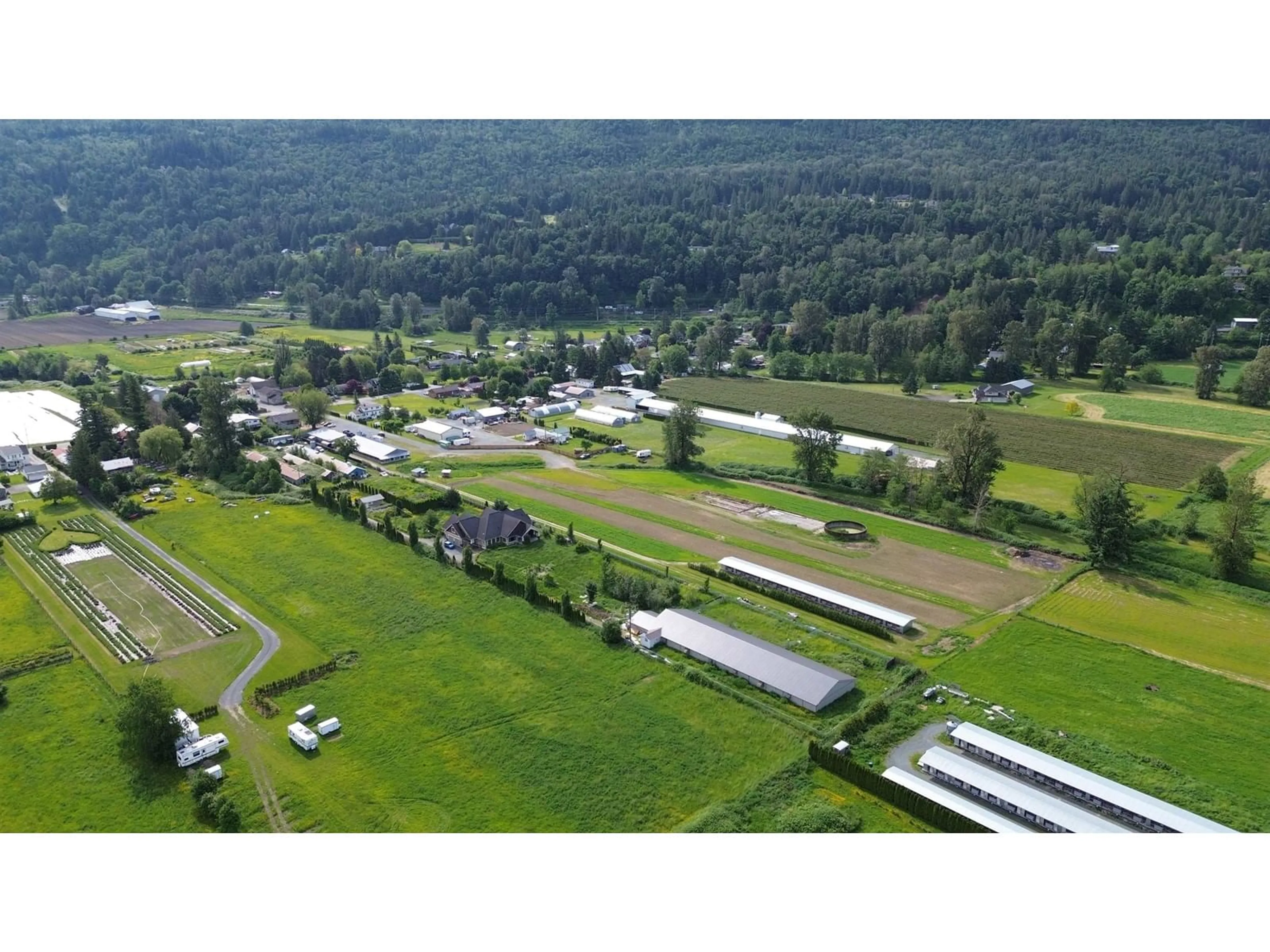 A pic from outside/outdoor area/front of a property/back of a property/a pic from drone, mountain view for 4195 ECKERT STREET, Yarrow British Columbia V2R5J6