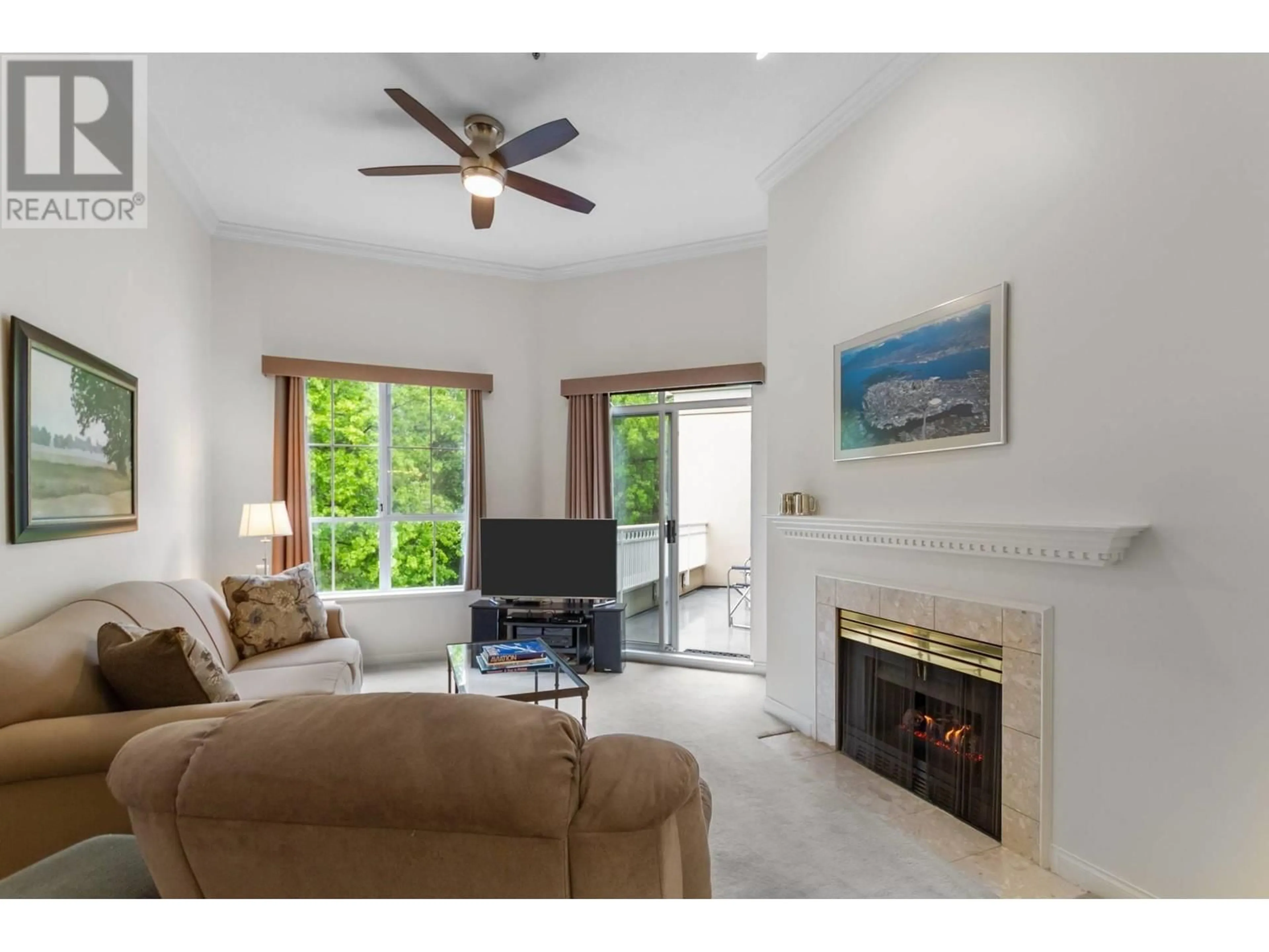 Living room with furniture, ceramic/tile floor for 409 - 2995 PRINCESS CRESCENT, Coquitlam British Columbia V3B7N1