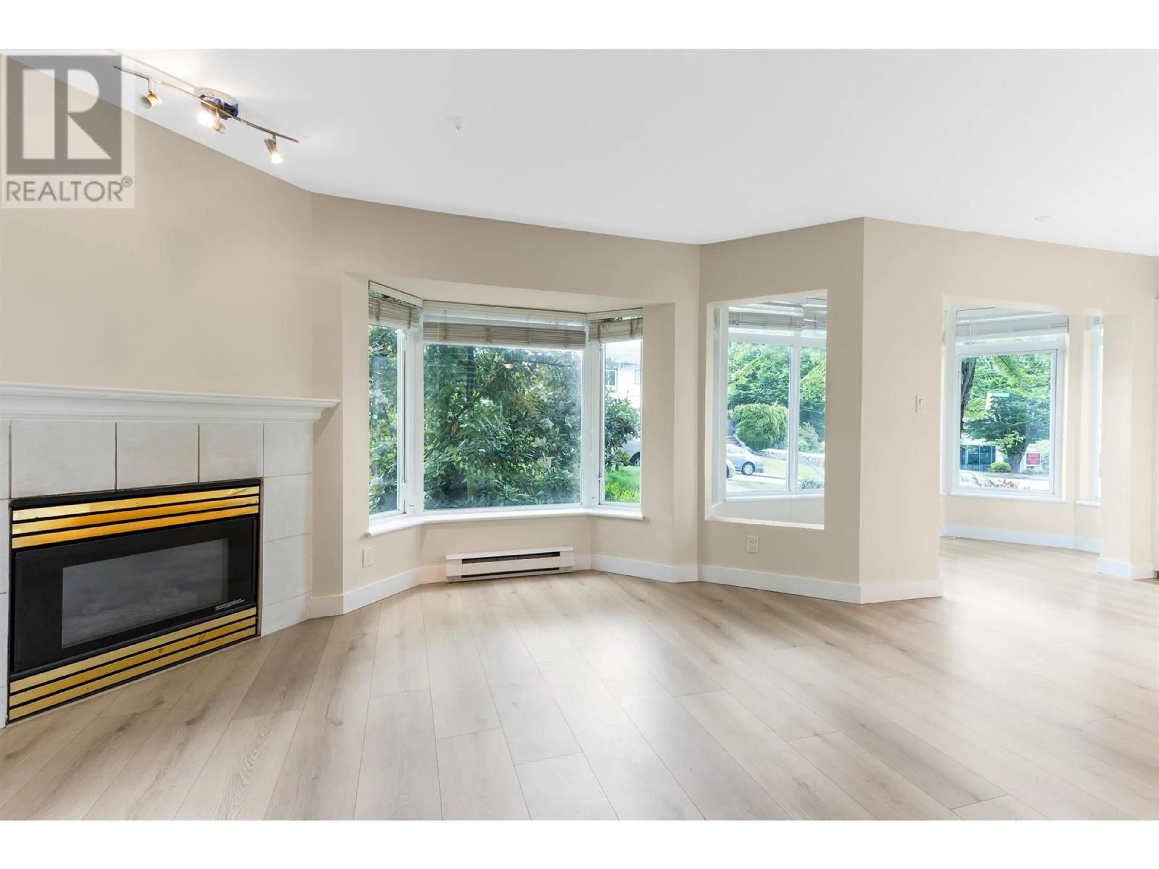 A pic of a room for 211 - 2677 BROADWAY, Vancouver British Columbia V5M1Y6