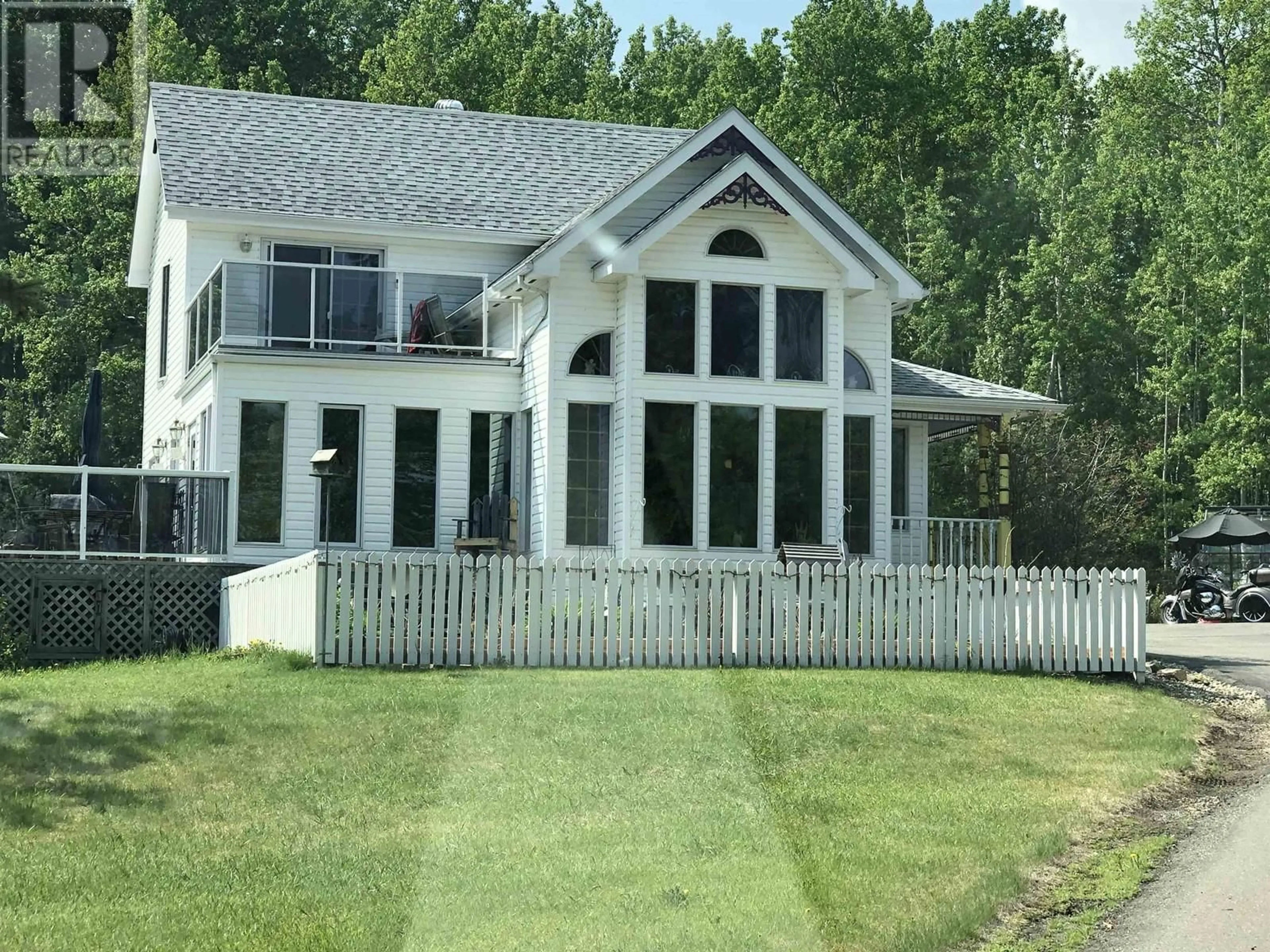 Home with vinyl exterior material, mountain view for 13744 GOLF COURSE ROAD, Charlie Lake British Columbia V1J8K8
