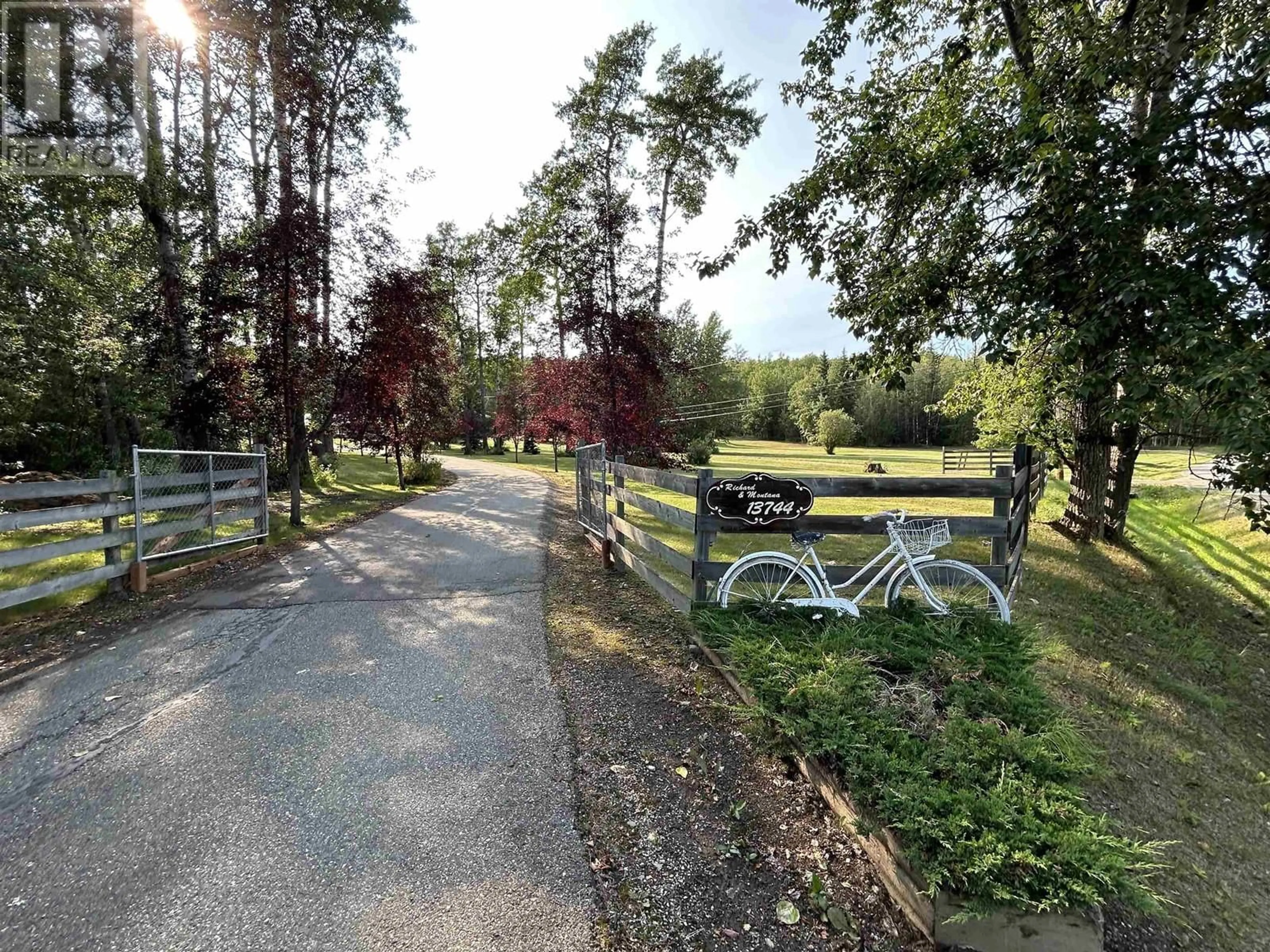 A pic from outside/outdoor area/front of a property/back of a property/a pic from drone, forest/trees view for 13744 GOLF COURSE ROAD, Charlie Lake British Columbia V1J8K8
