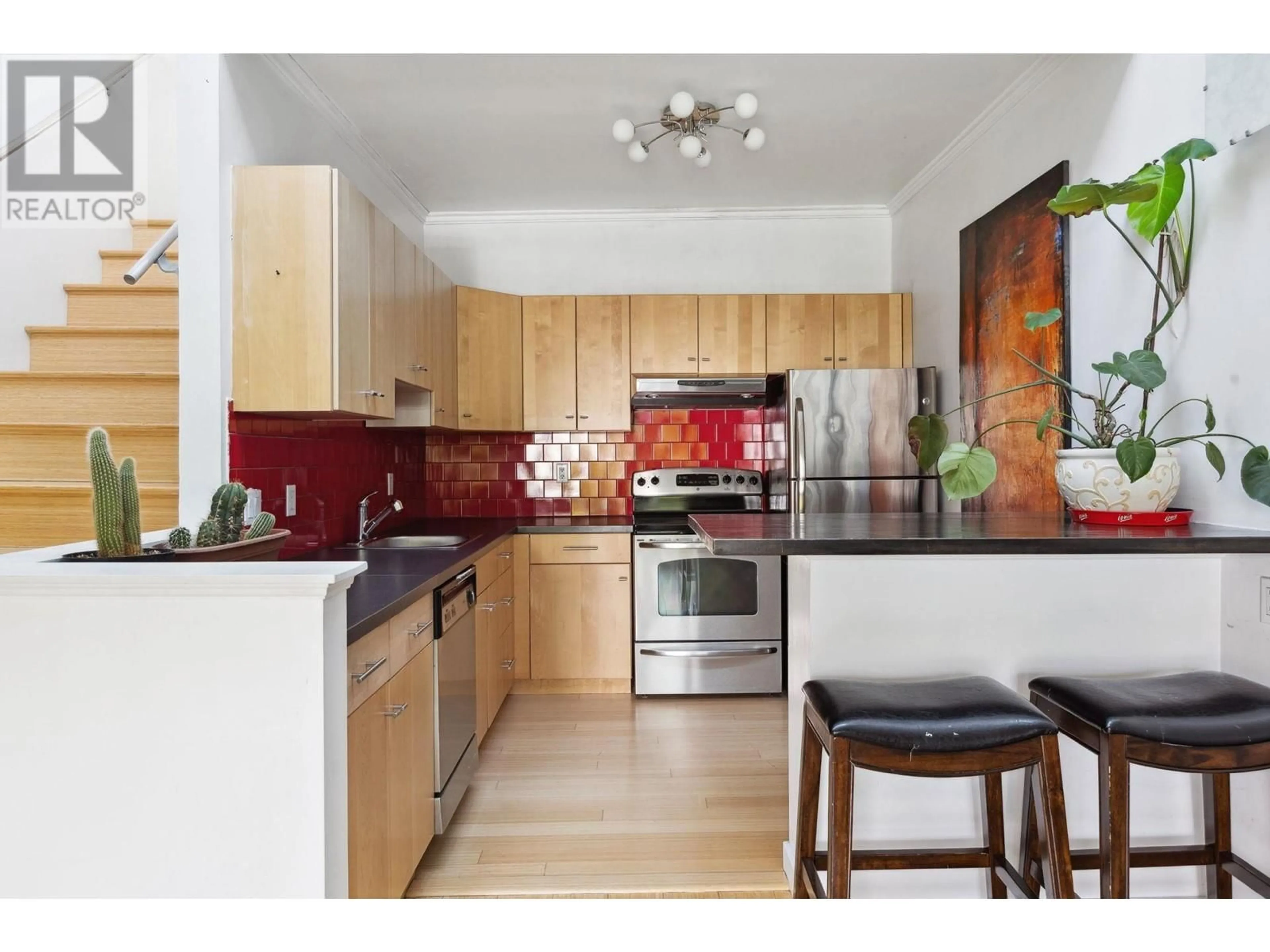 Open concept kitchen, unknown for 315 - 251 4TH STREET, North Vancouver British Columbia V7M1H8