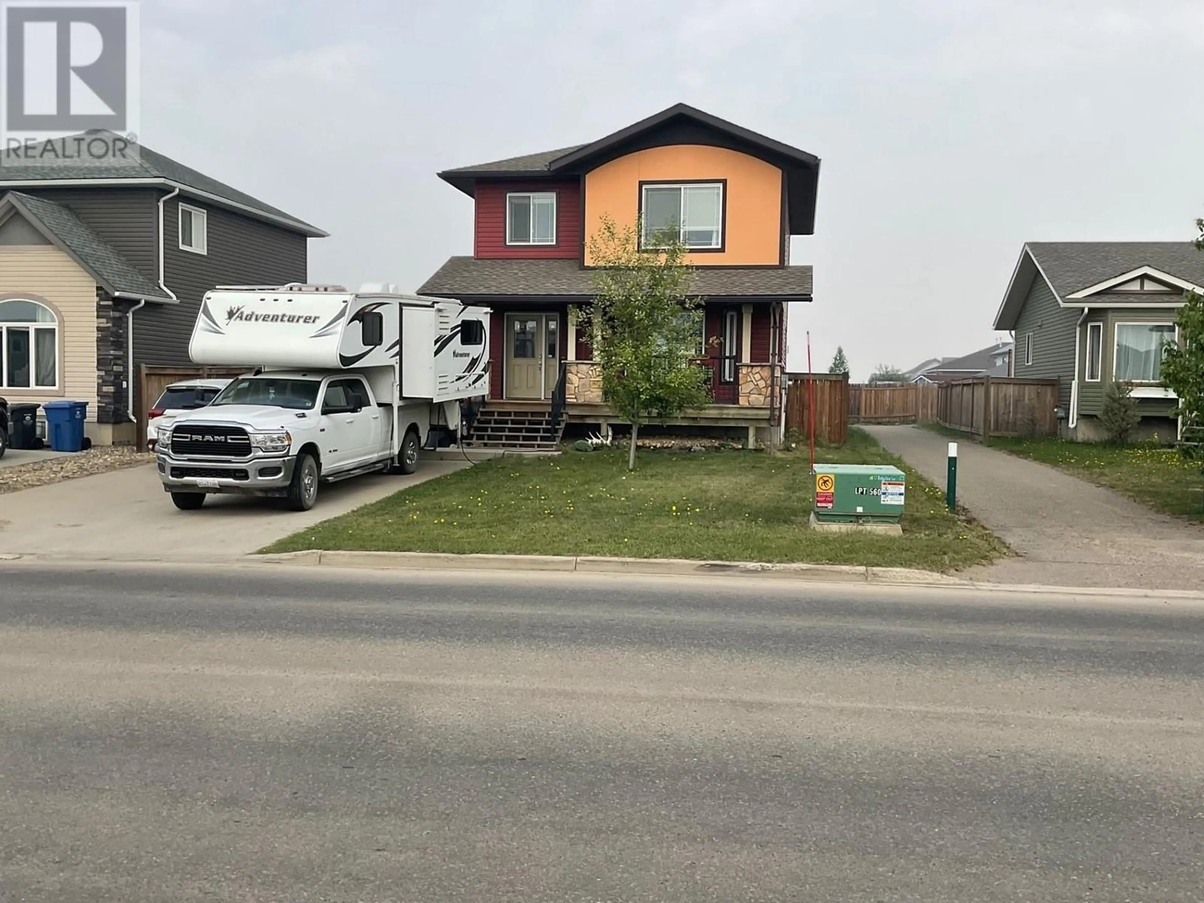Home with vinyl exterior material, street for 8912 112 AVENUE, Fort St. John British Columbia V1J0J1