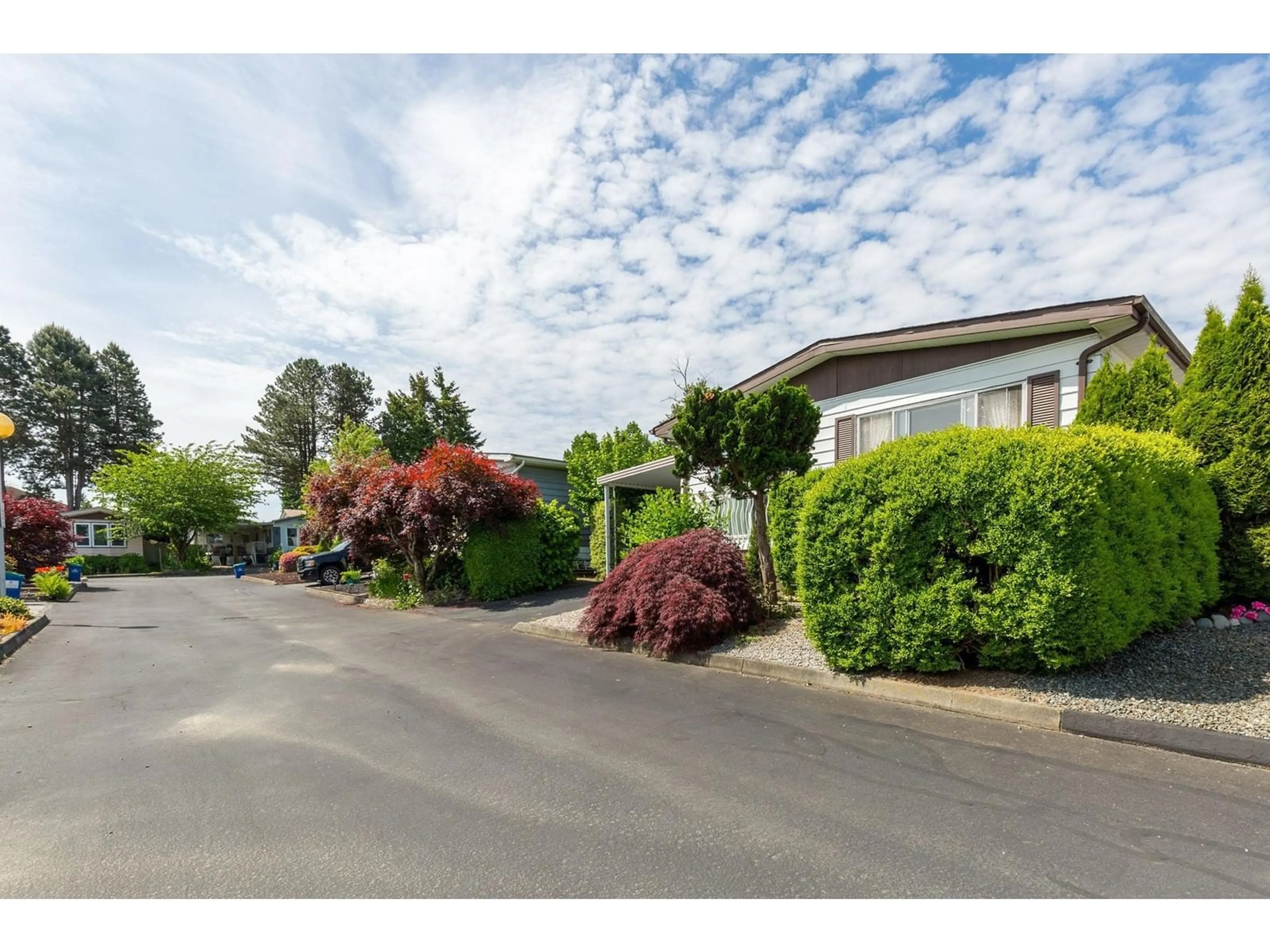 A pic from outside/outdoor area/front of a property/back of a property/a pic from drone, street for 124 - 8234 134, Surrey British Columbia V3W4V1