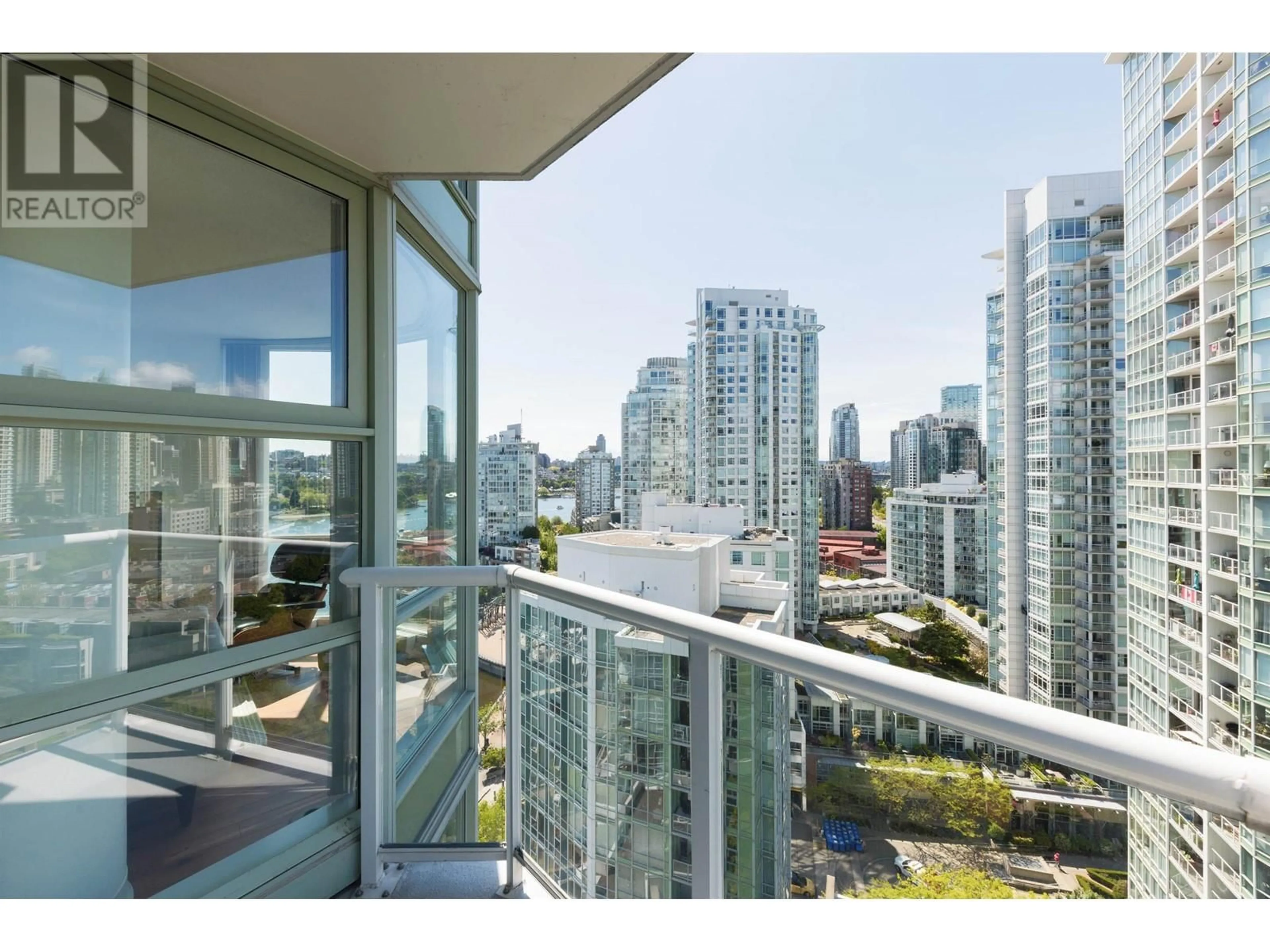 Balcony in the apartment, city buildings view from balcony for 2106 - 1077 MARINASIDE CRESCENT, Vancouver British Columbia V6Z2Z5