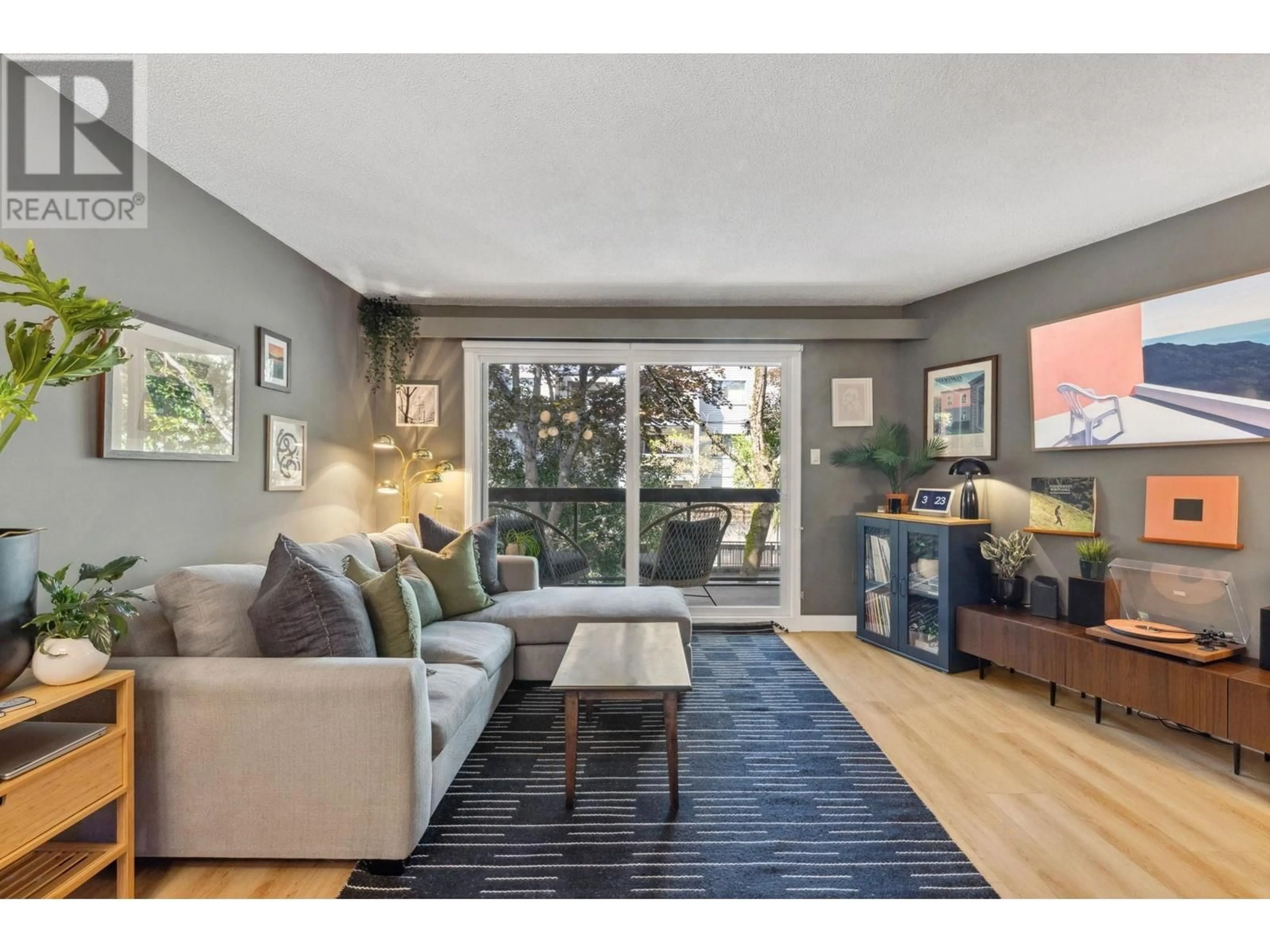 Living room with furniture, wood/laminate floor for 204 - 1429 4TH AVENUE, Vancouver British Columbia V5N1J6
