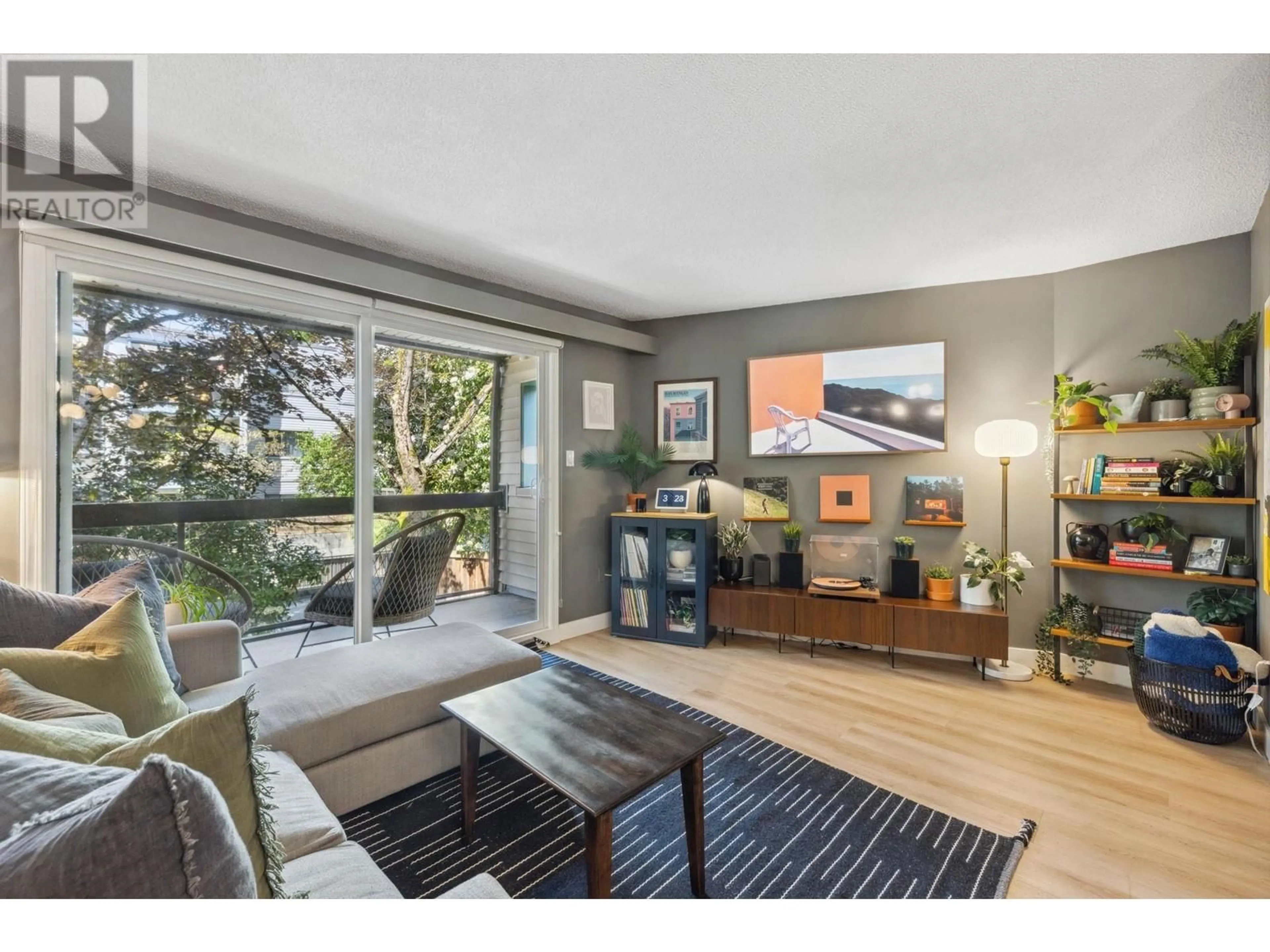 Living room with furniture, wood/laminate floor for 204 - 1429 4TH AVENUE, Vancouver British Columbia V5N1J6