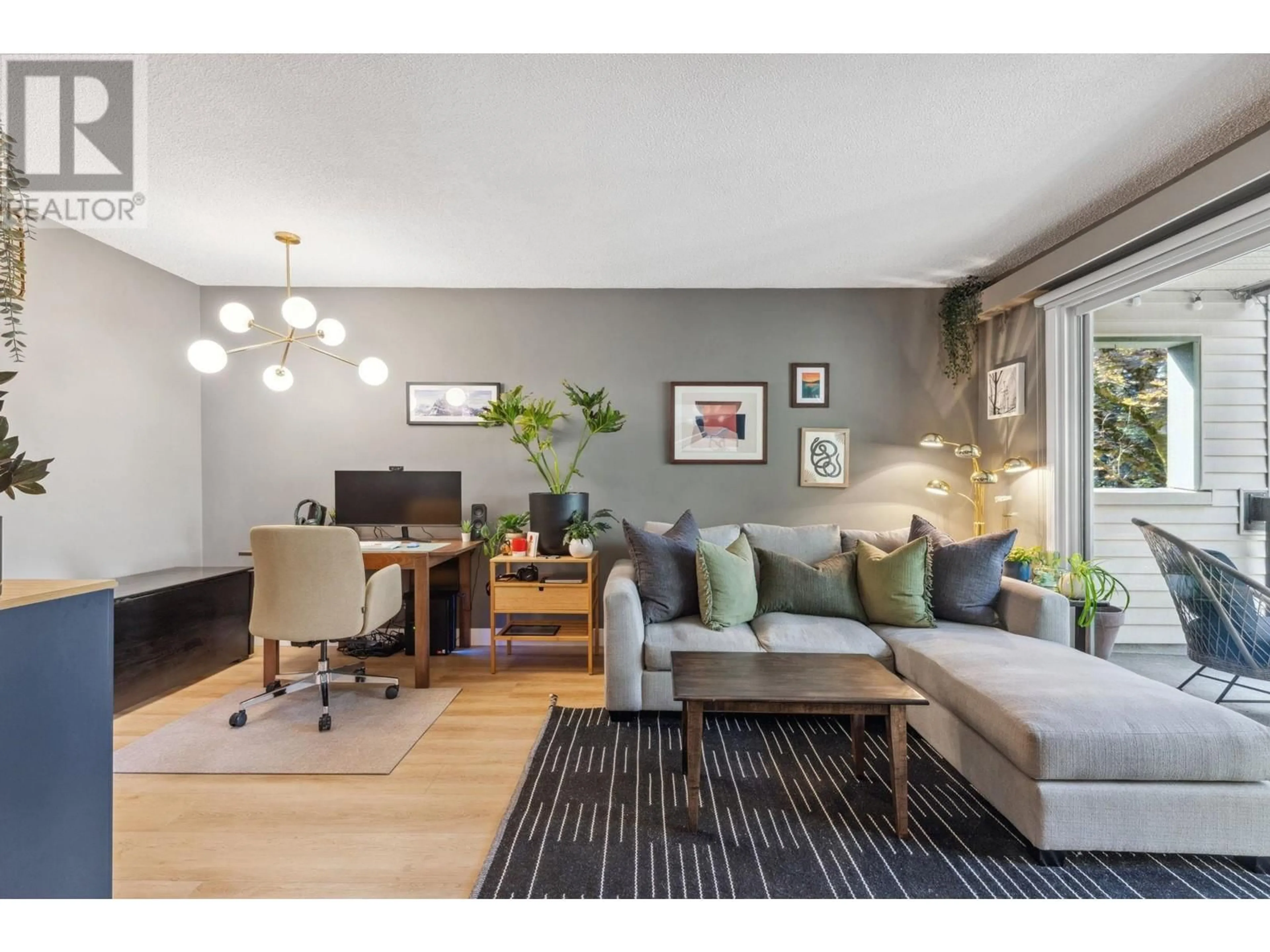 Living room with furniture, wood/laminate floor for 204 - 1429 4TH AVENUE, Vancouver British Columbia V5N1J6