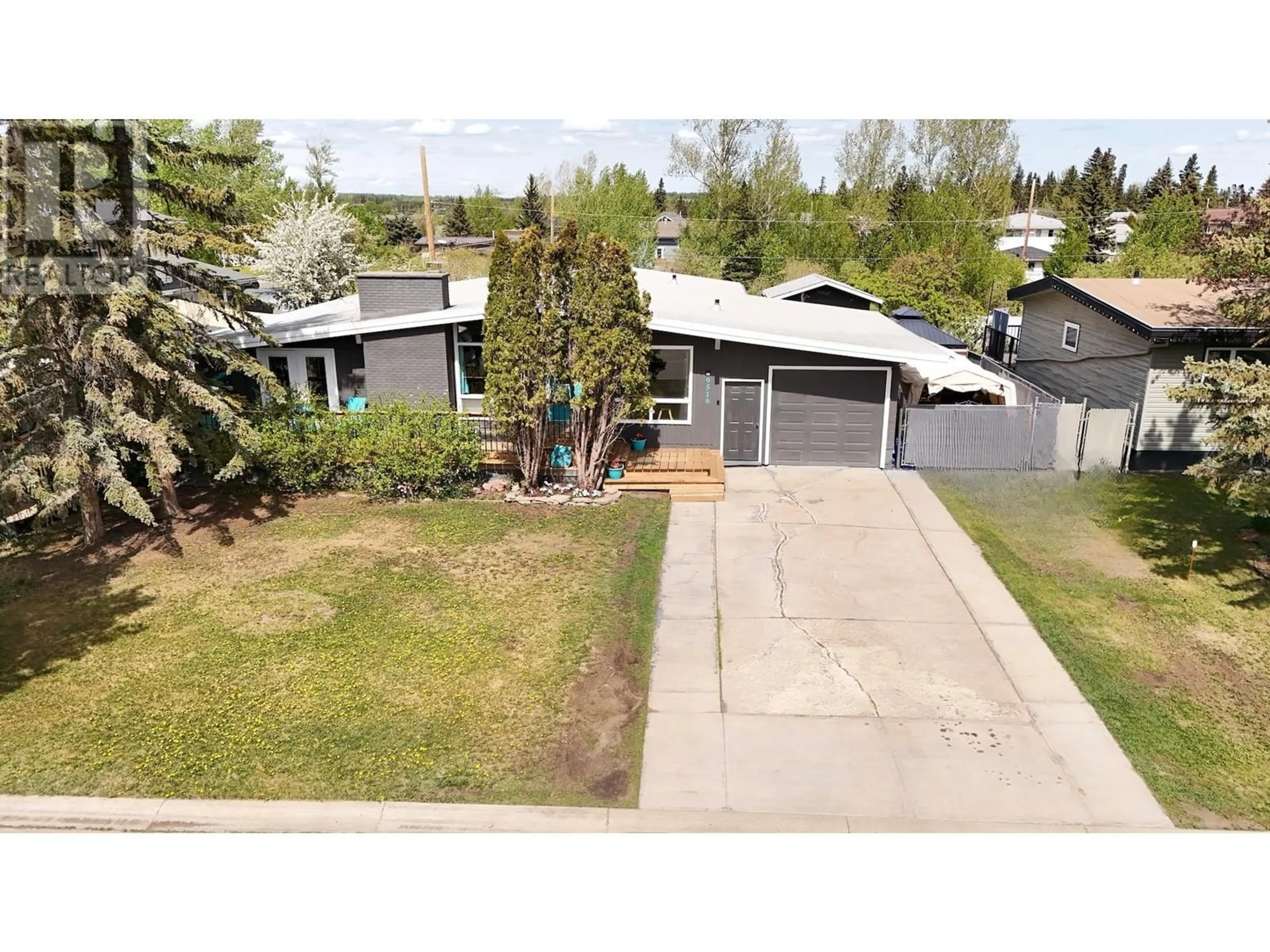 A pic from outside/outdoor area/front of a property/back of a property/a pic from drone, street for 9516 113 AVENUE, Fort St. John British Columbia V1J2W9