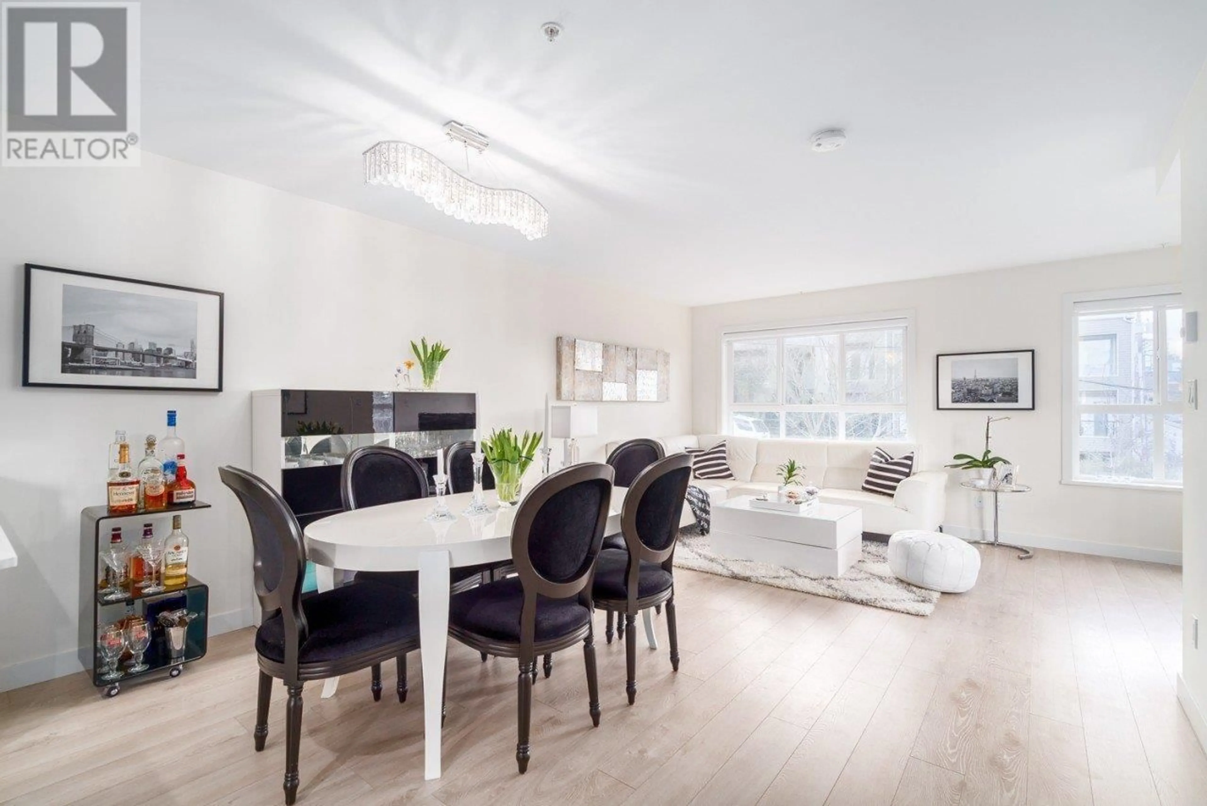 Living room with furniture, wood/laminate floor for 201 - 1190 6TH AVENUE, Vancouver British Columbia V6H1A4