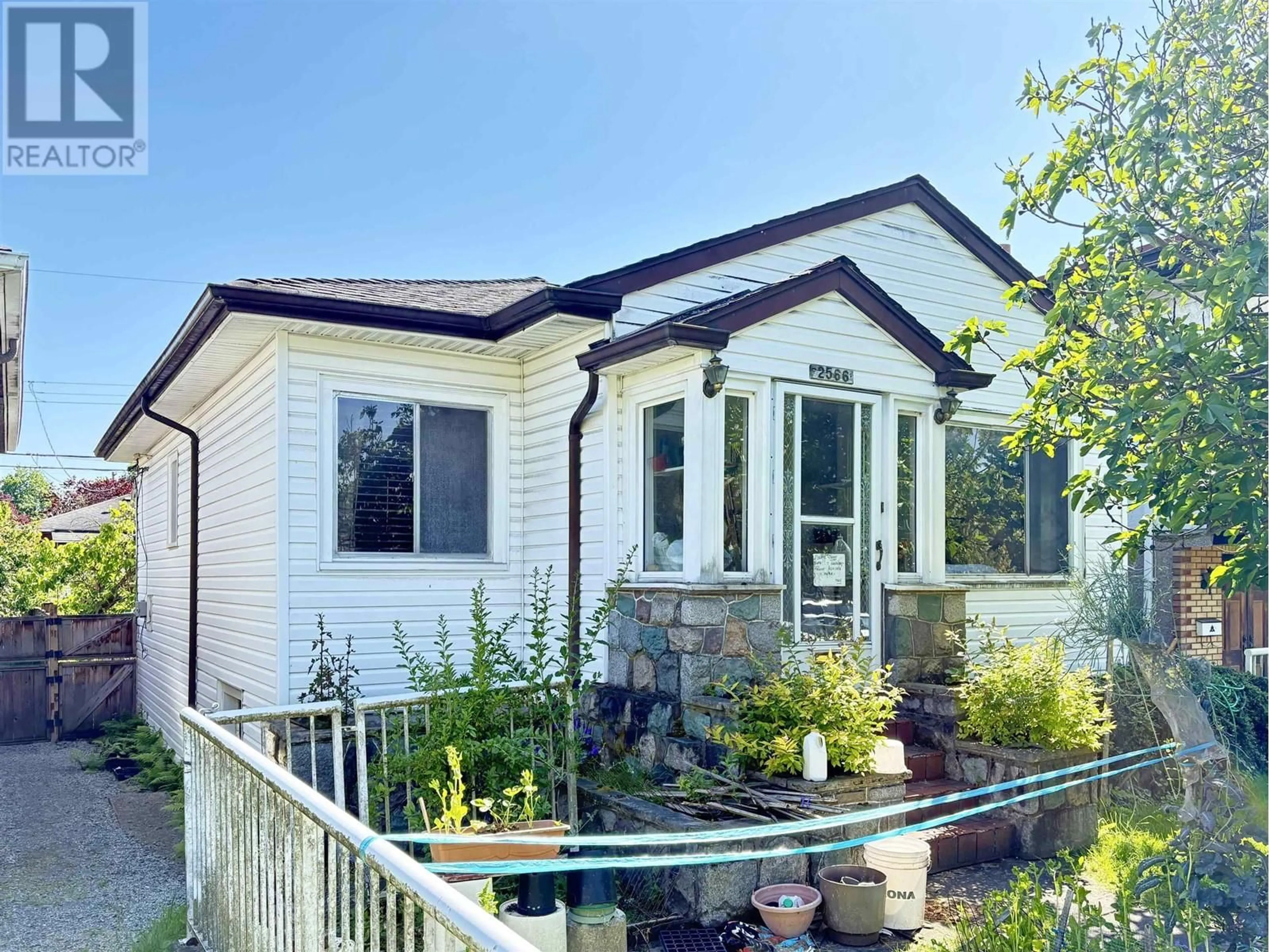 Home with vinyl exterior material, street for 2566 VENABLES STREET, Vancouver British Columbia V5K2R1