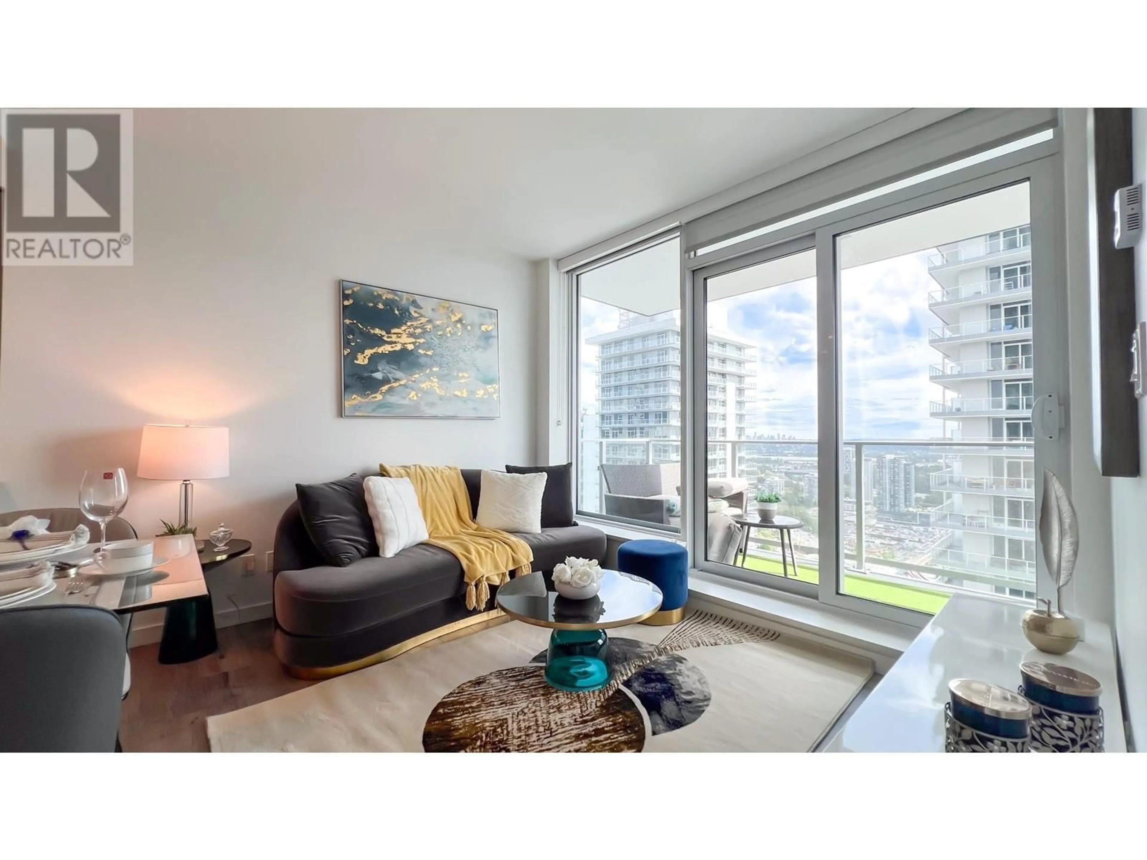 Living room with furniture, wood/laminate floor for 3106 - 3809 EVERGREEN PLACE, Burnaby British Columbia V3J0M1