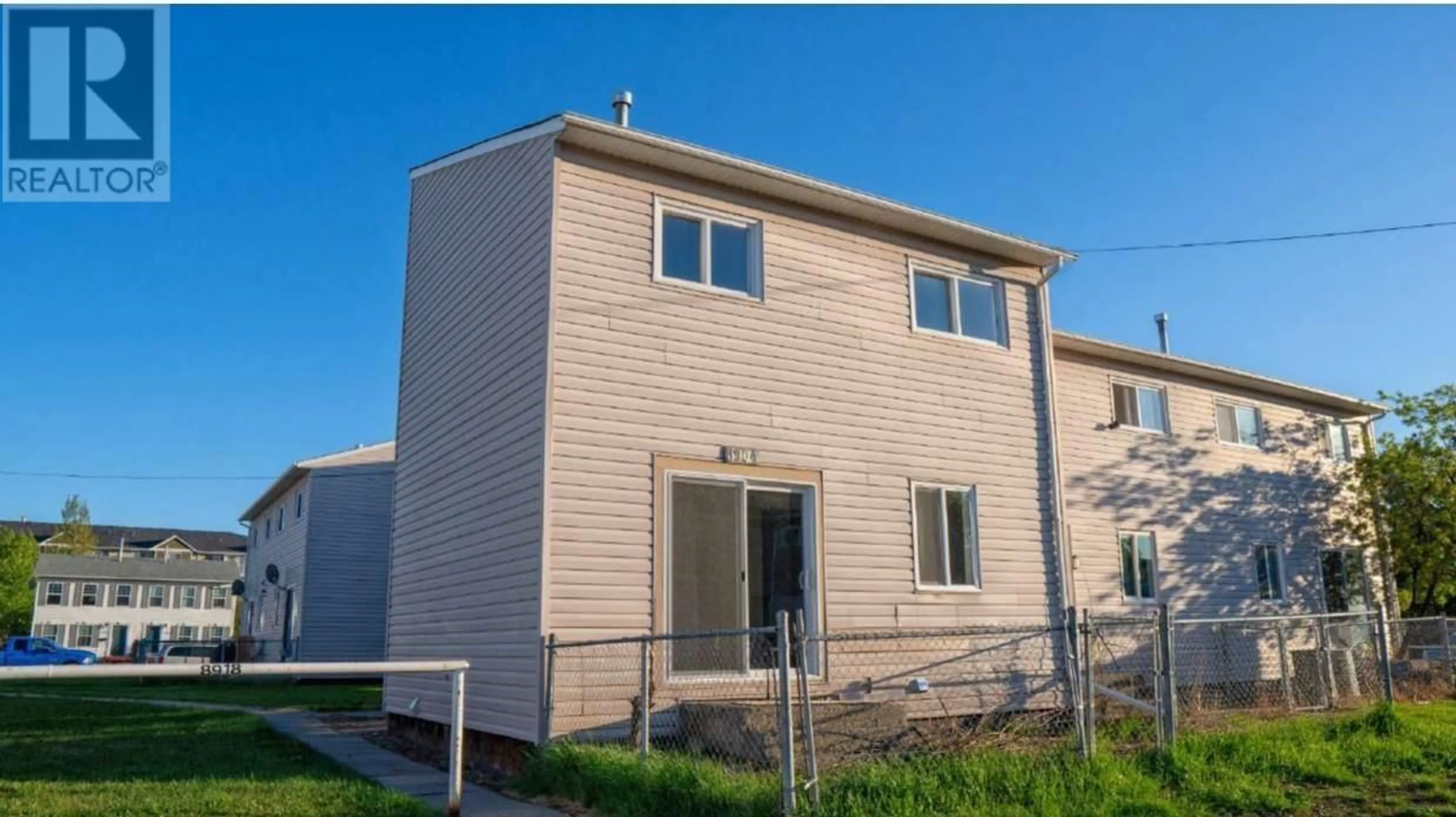 Home with vinyl exterior material, building for 8904 101 AVENUE, Fort St. John British Columbia V1J5G2