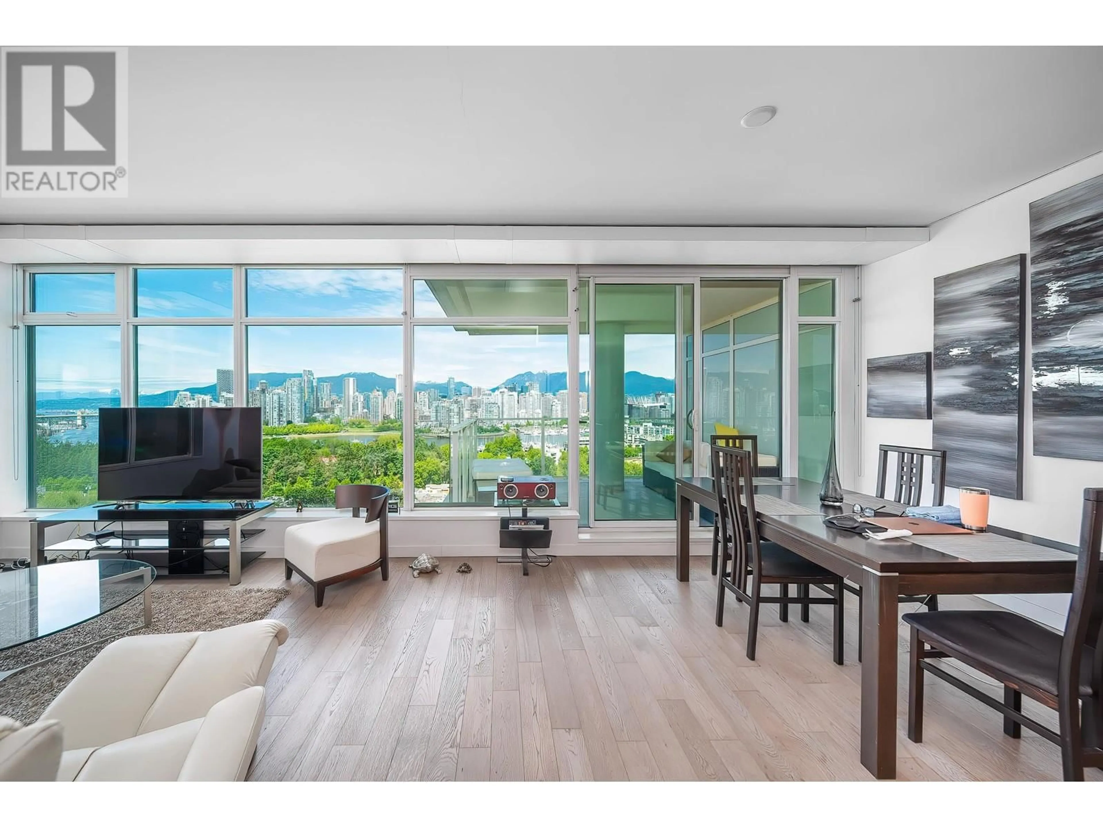Living room with furniture, wood/laminate floor for 1502 - 2411 HEATHER STREET, Vancouver British Columbia V5Z0B7