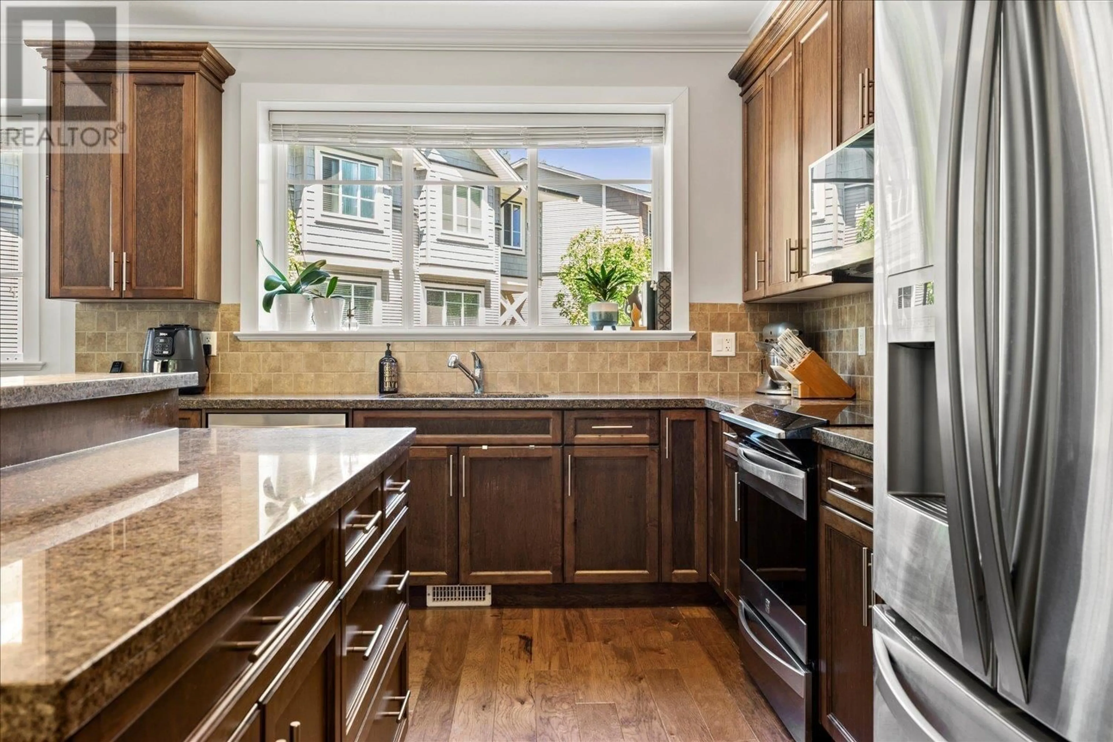 Open concept kitchen, ceramic/tile floor for 71 - 11252 COTTONWOOD DRIVE, Maple Ridge British Columbia V2X9B1