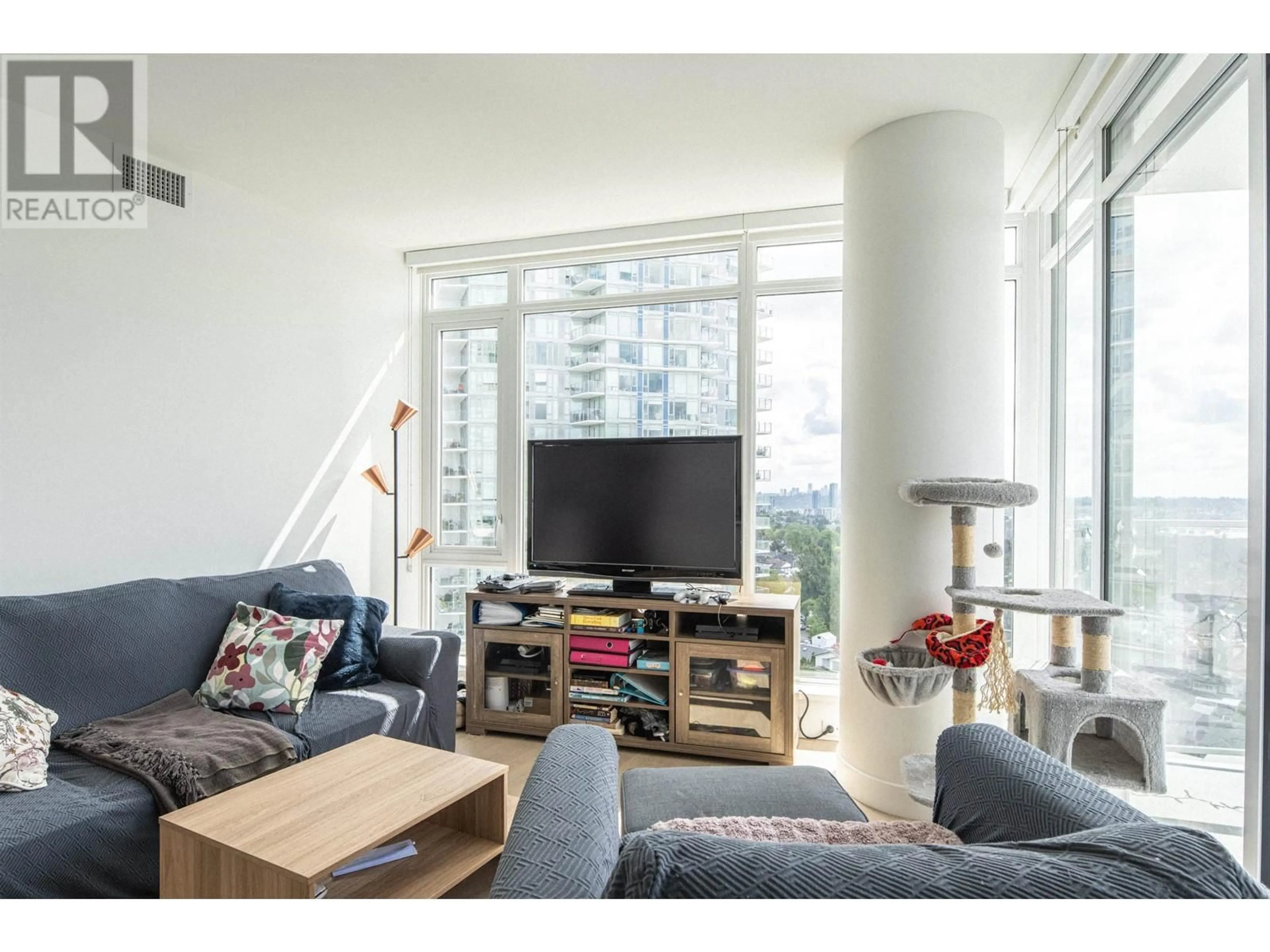 Living room with furniture, wood/laminate floor for 1306 - 7683 PARK CRESCENT, Burnaby British Columbia V3N0J3