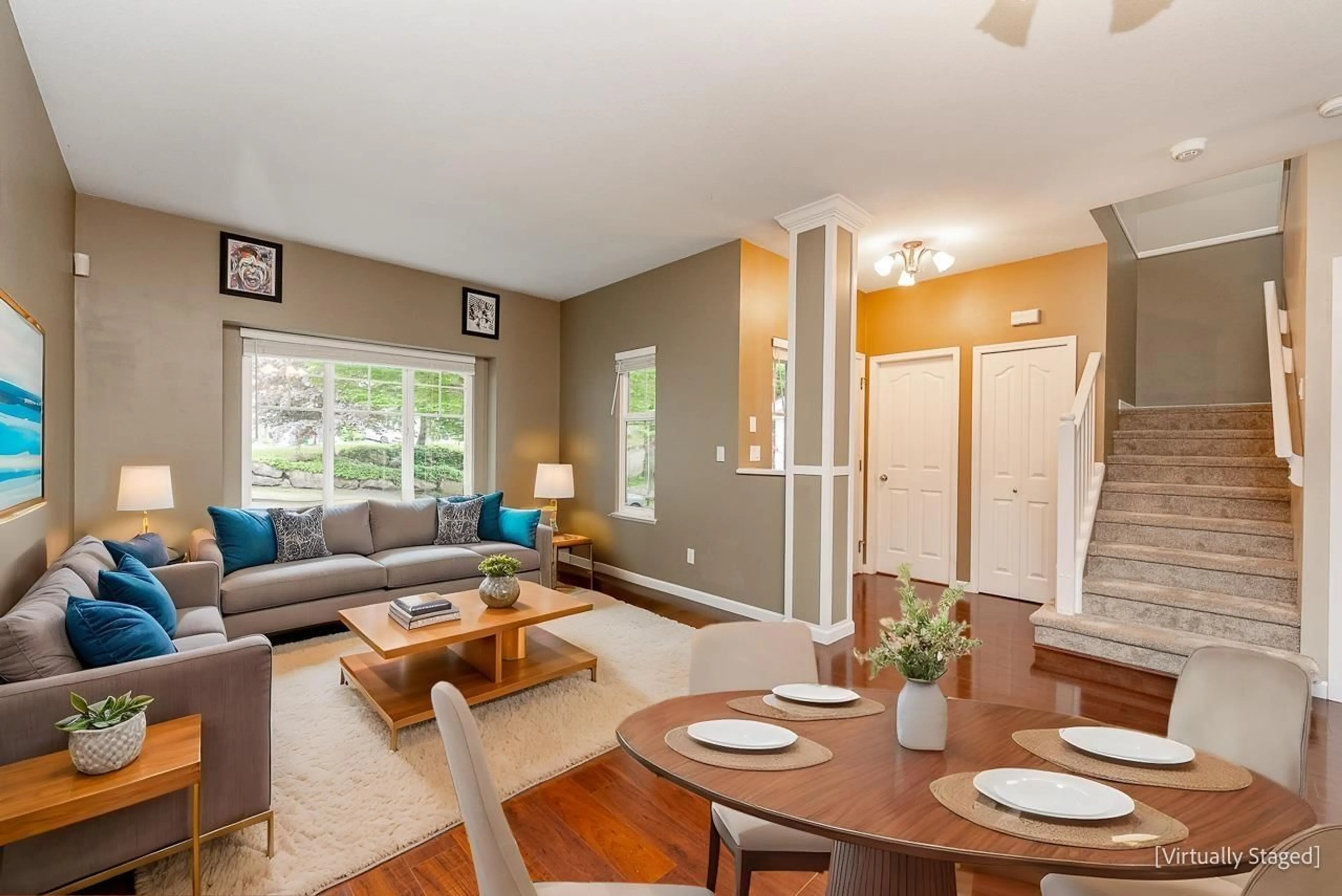 Living room with furniture, wood/laminate floor for 4389 ATWOOD, Abbotsford British Columbia V3G2Y7