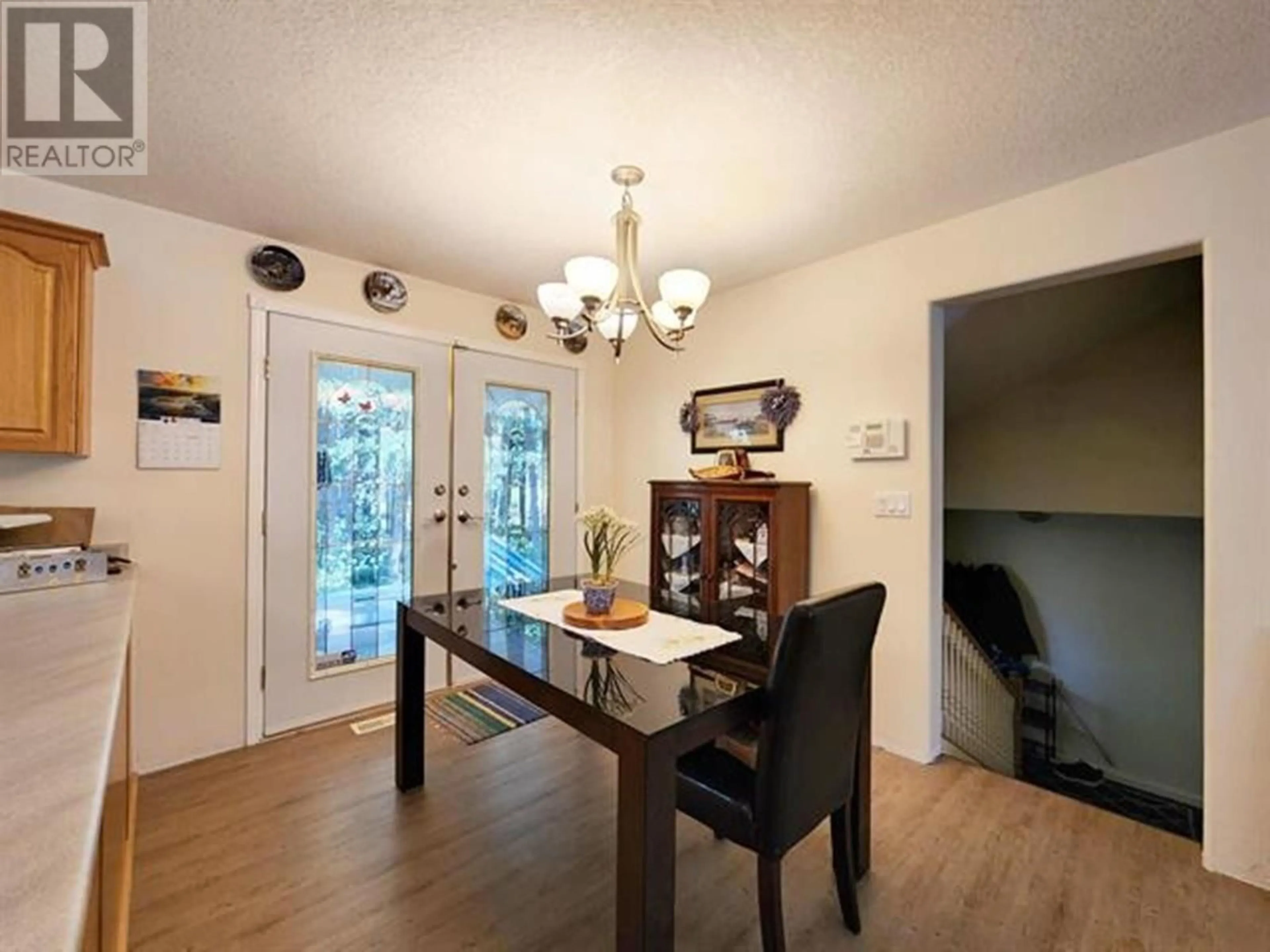 Dining room, wood/laminate floor for 2711 ROBERTA ROAD, Quesnel British Columbia V2J6L5