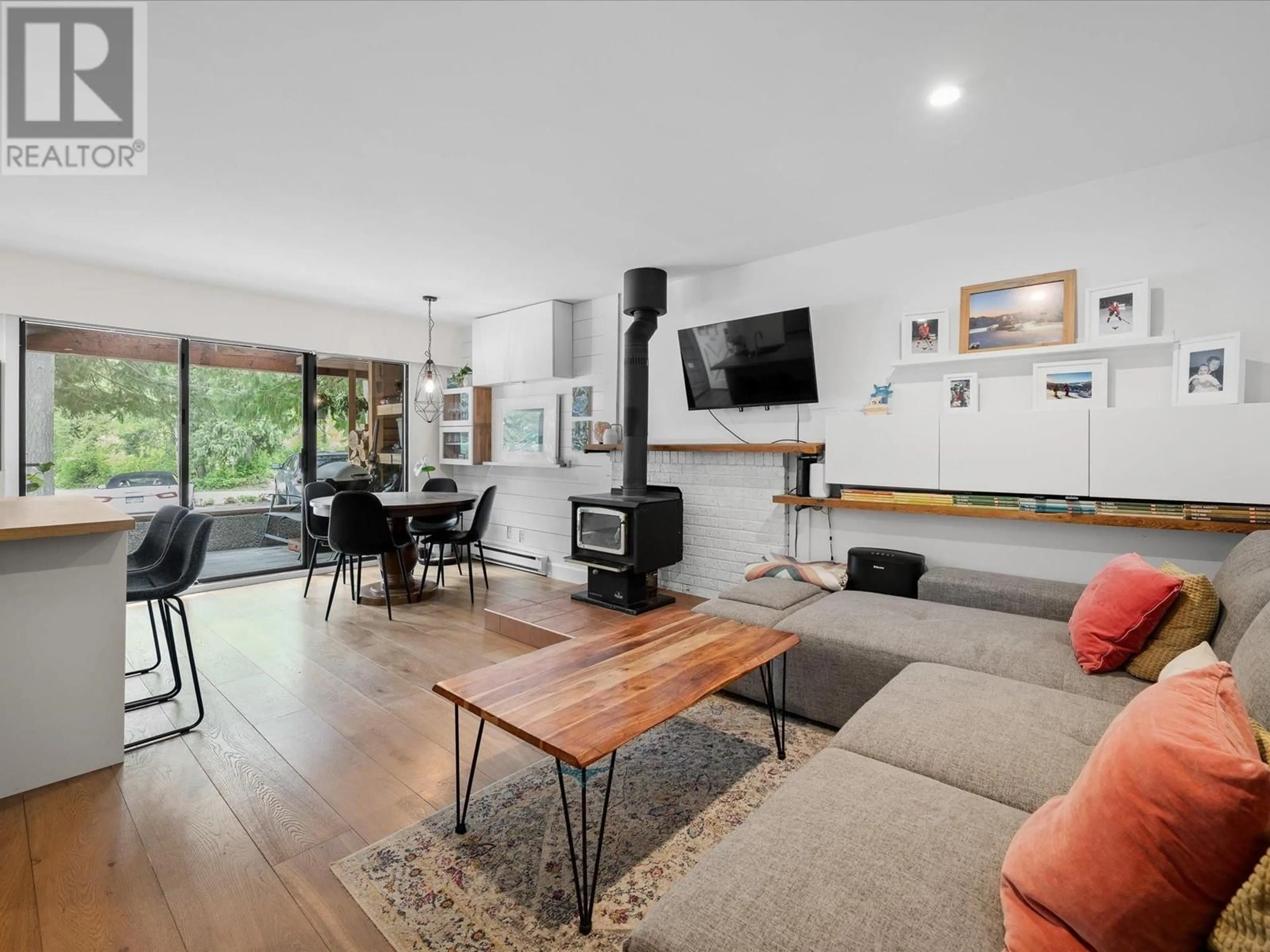 Living room with furniture, wood/laminate floor for 1 - 8003 TIMBER LANE, Whistler British Columbia V8E1K9