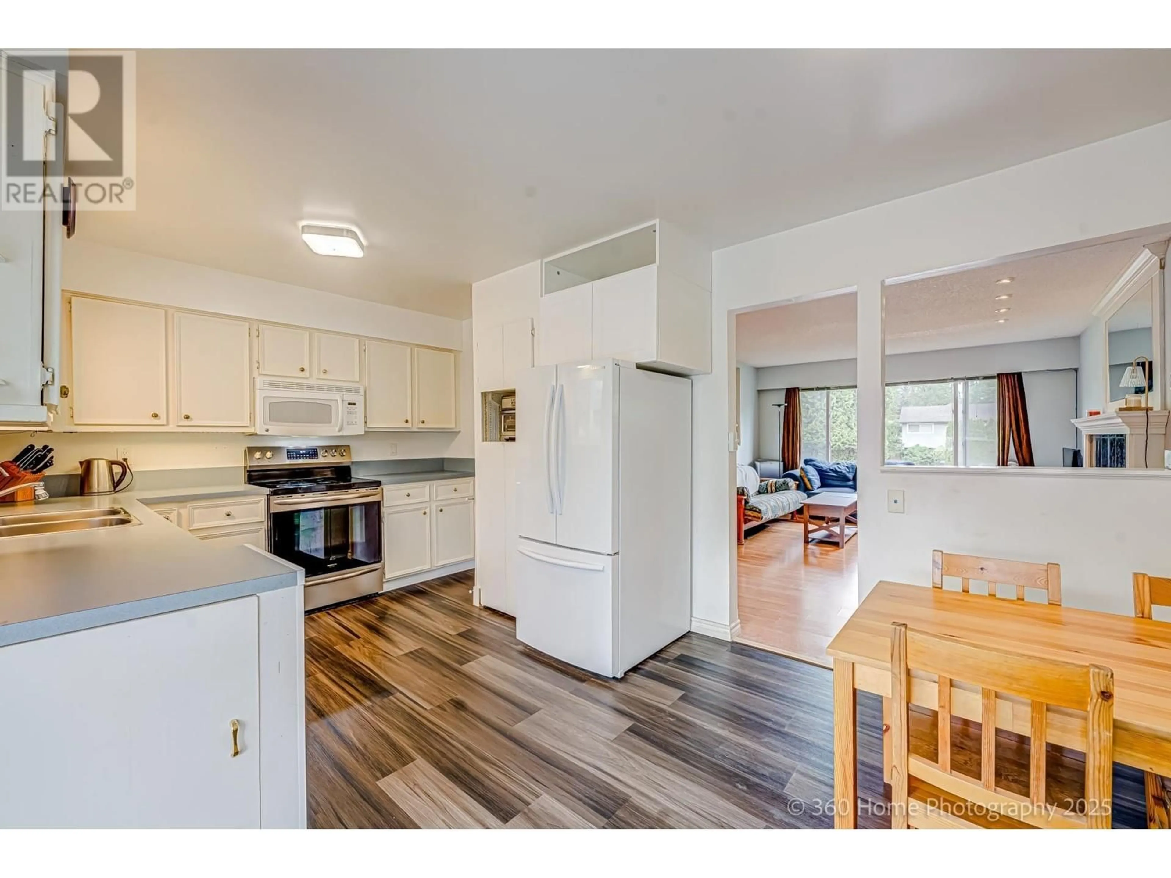 Open concept kitchen, wood/laminate floor for 3958 COAST MERIDIAN ROAD, Port Coquitlam British Columbia V3B3P4